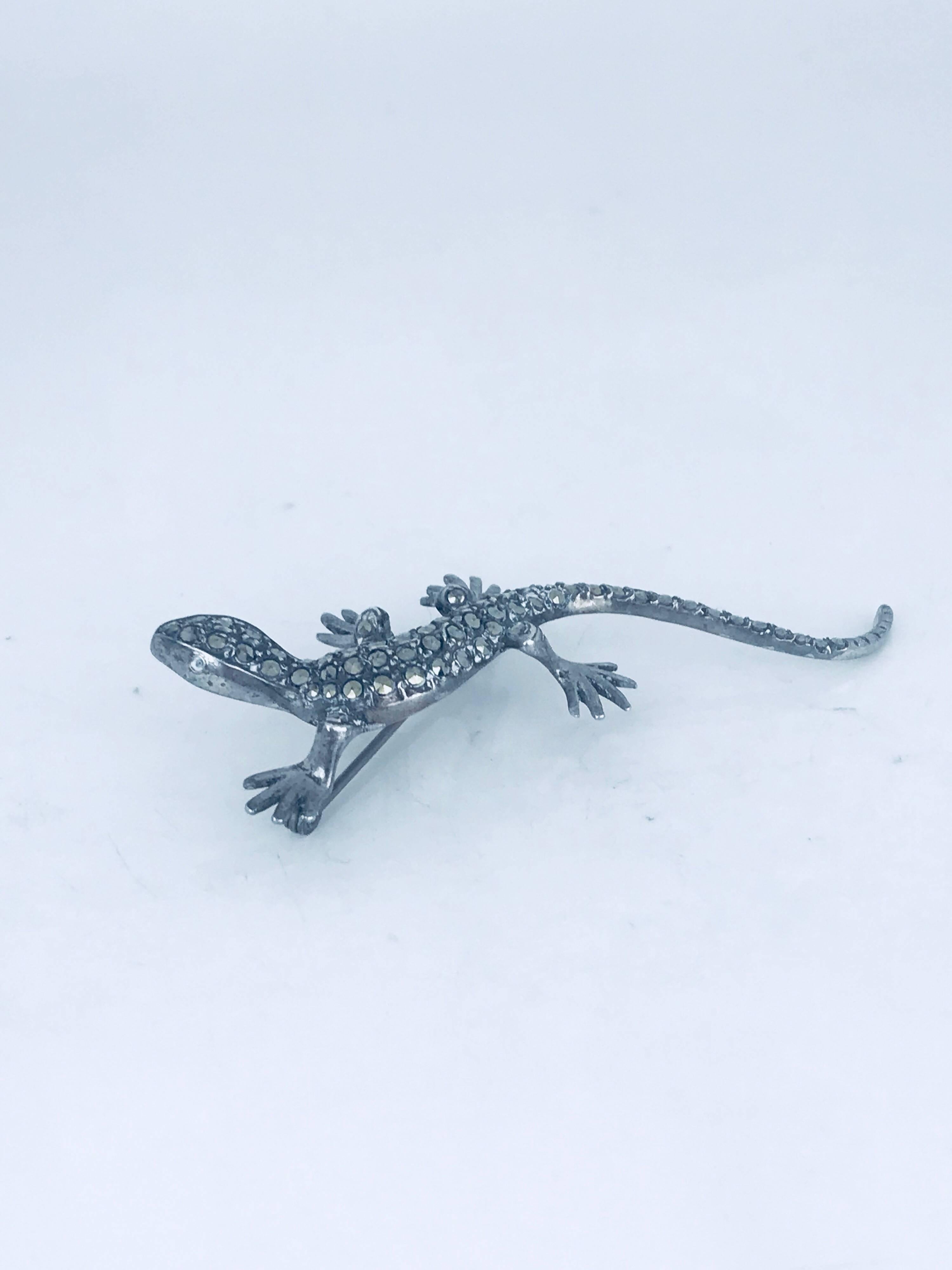 Salamander, German Sterling Silver 2-3/4 Length, Marcasite stone Pin
The pin length is one inch wide.

Sterling Silver, marked Germany

GIA Gemologist, inspected & evaluated