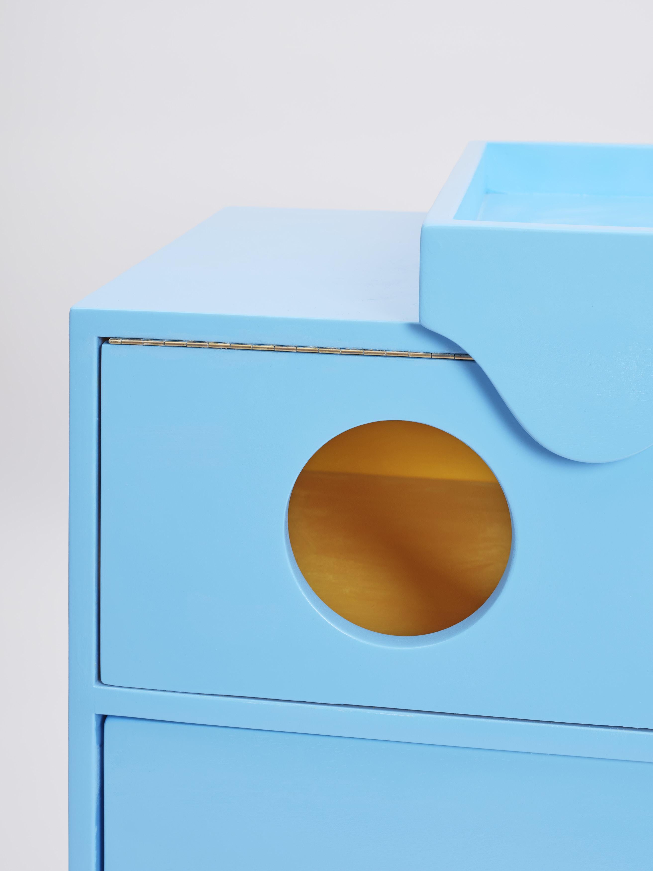 A cabinet for storage.
A changing table for babies.

The “SALAMONDA” was designed as a storage unit and changing table for babies.
The wave shaped top can be taken off and work as a tray for clothes and diaper change for babies, 
whilst the