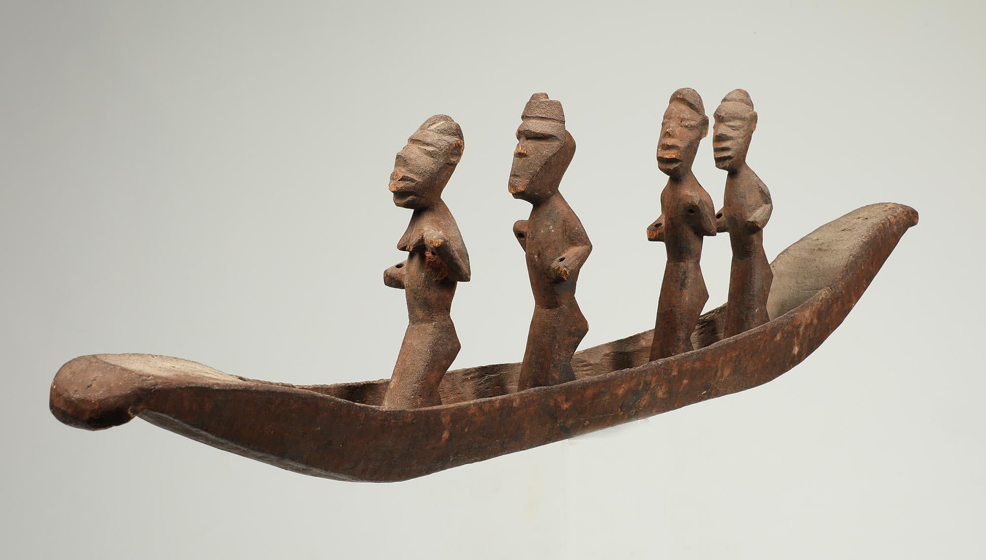 Hand-Carved Salampasu Ritual Wood Boat with Four Masked Figure & Attendants Congo For Sale