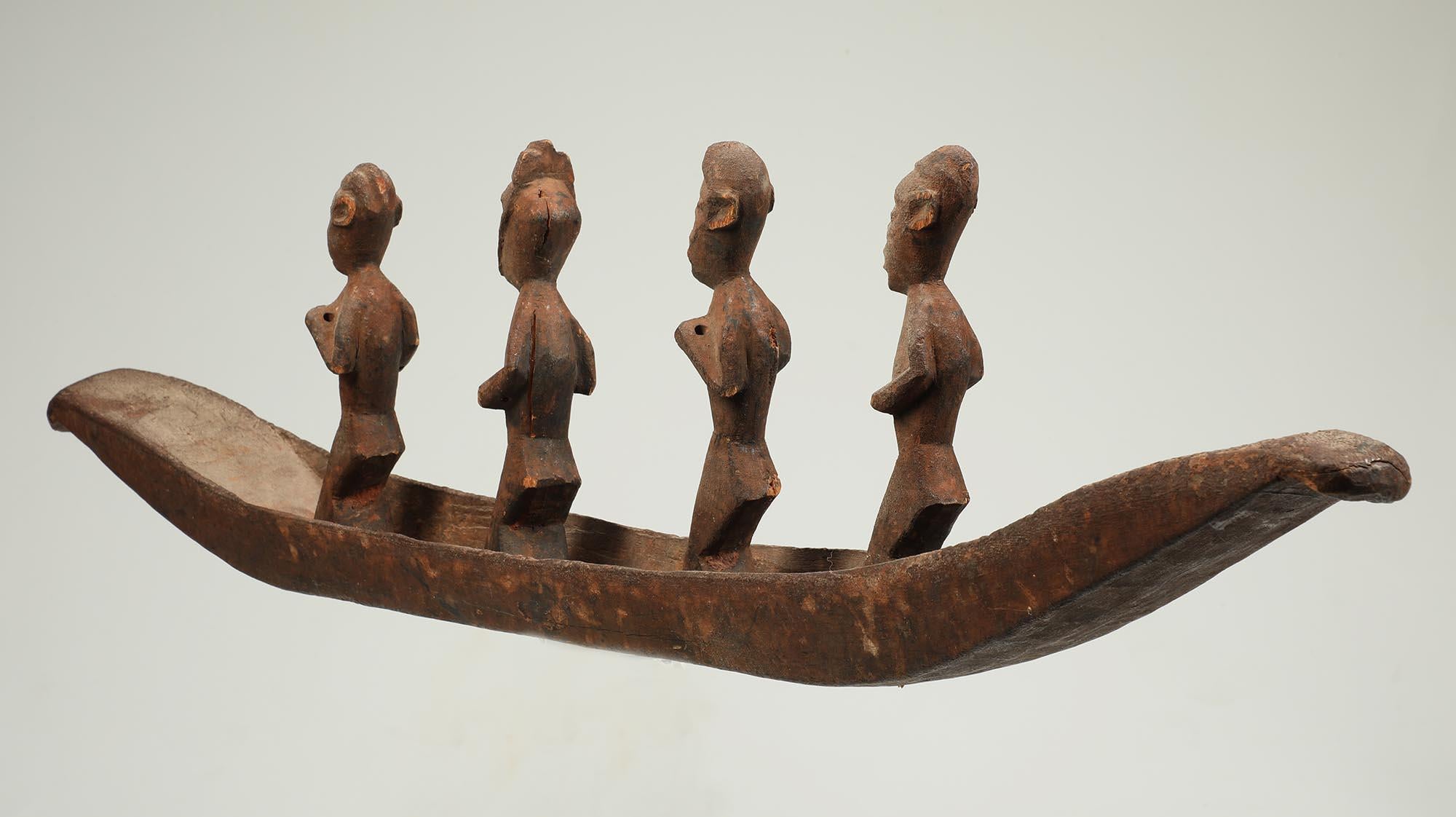20th Century Salampasu Ritual Wood Boat with Four Masked Figure & Attendants Congo For Sale