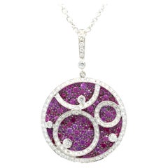 Salavetti 18 Karat White Gold Ruby and Diamond Circle Swirl Necklace