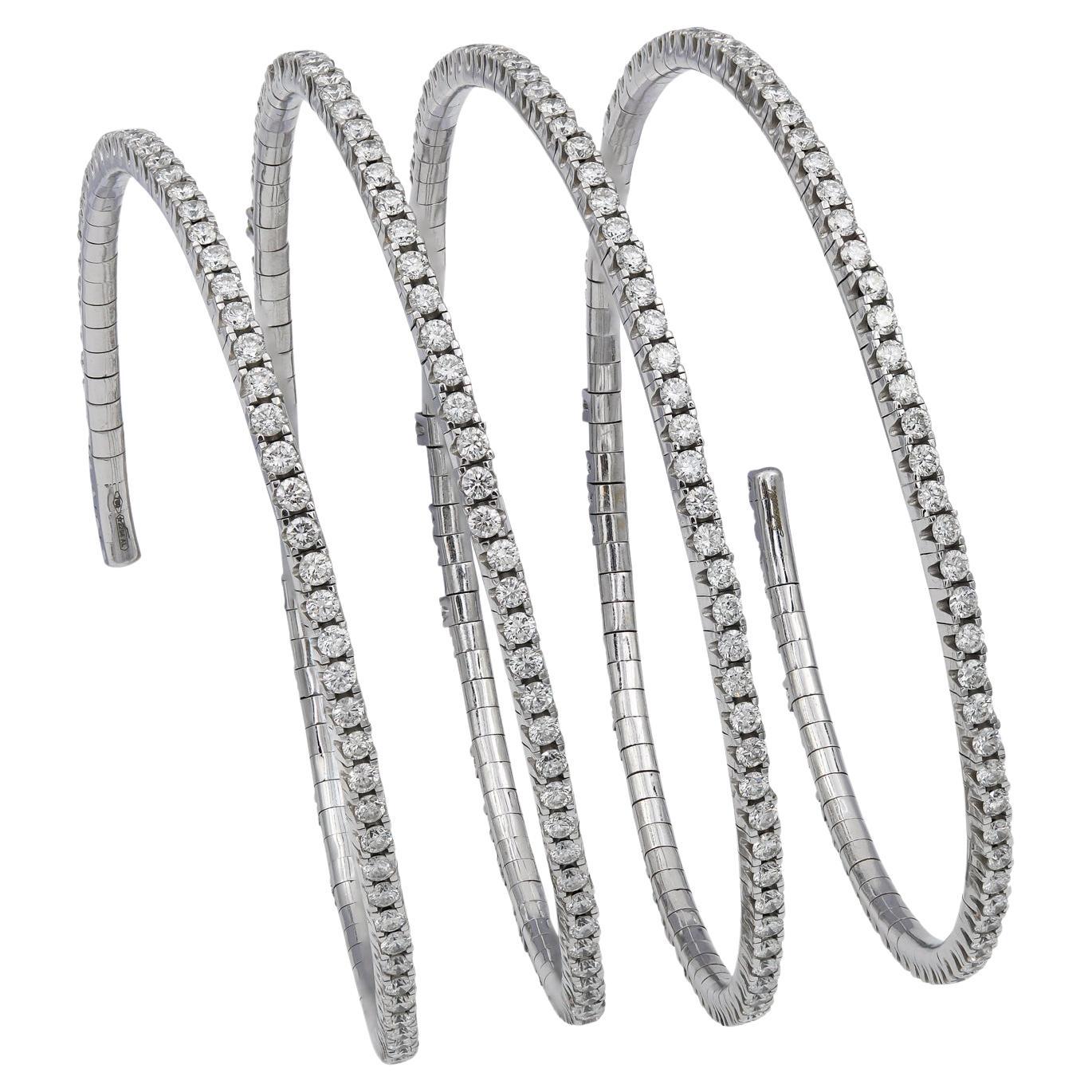 Brazalete en espiral de oro con diamantes Salavetti en venta