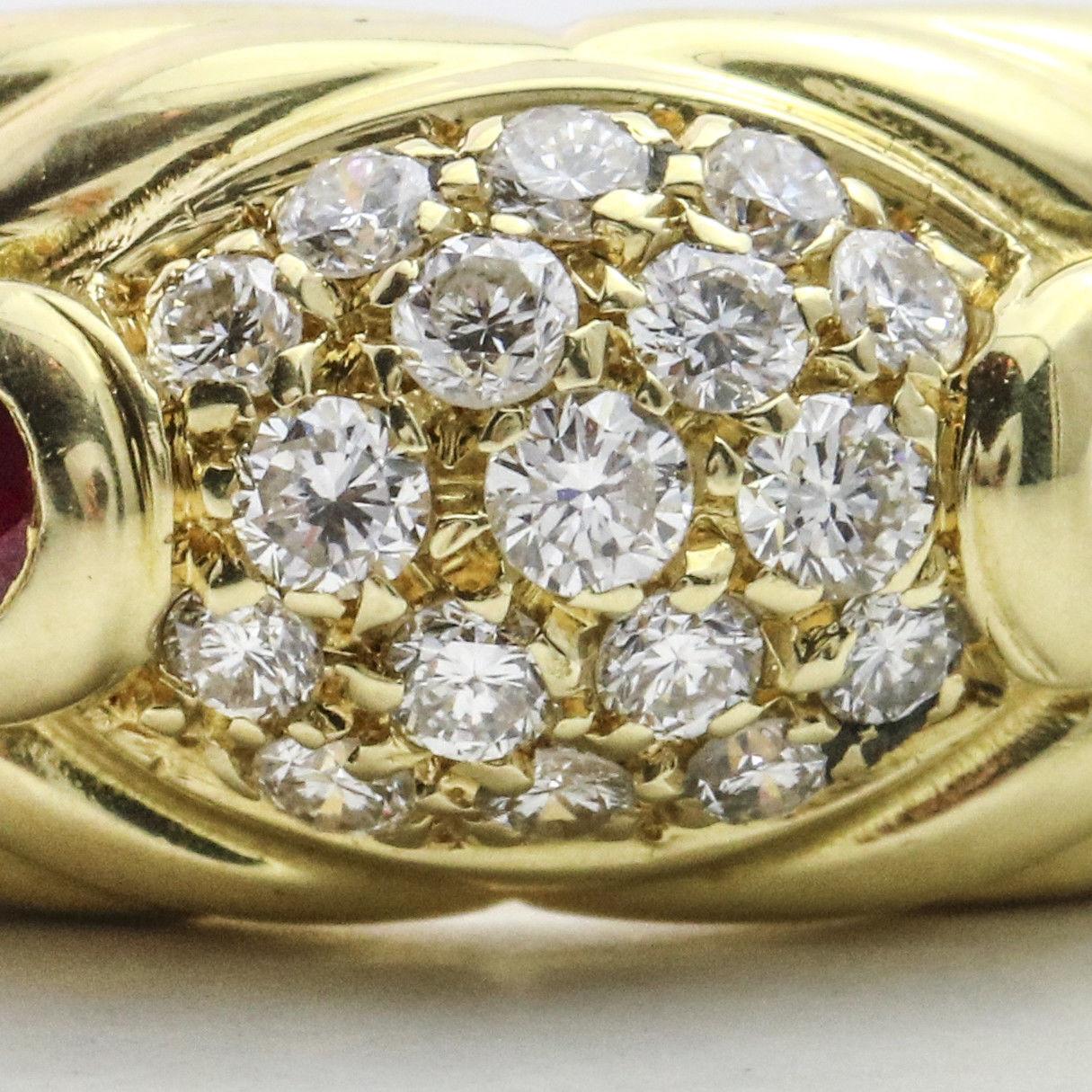 Vintage Salavetti 18k yellow gold band with pave-set round diamonds and two pear ruby accents. Size 6. Estimated total carat weight, .50 carats. Guaranteed Authentic.

Previously owned, in excellent condition with expected wear. Professionally