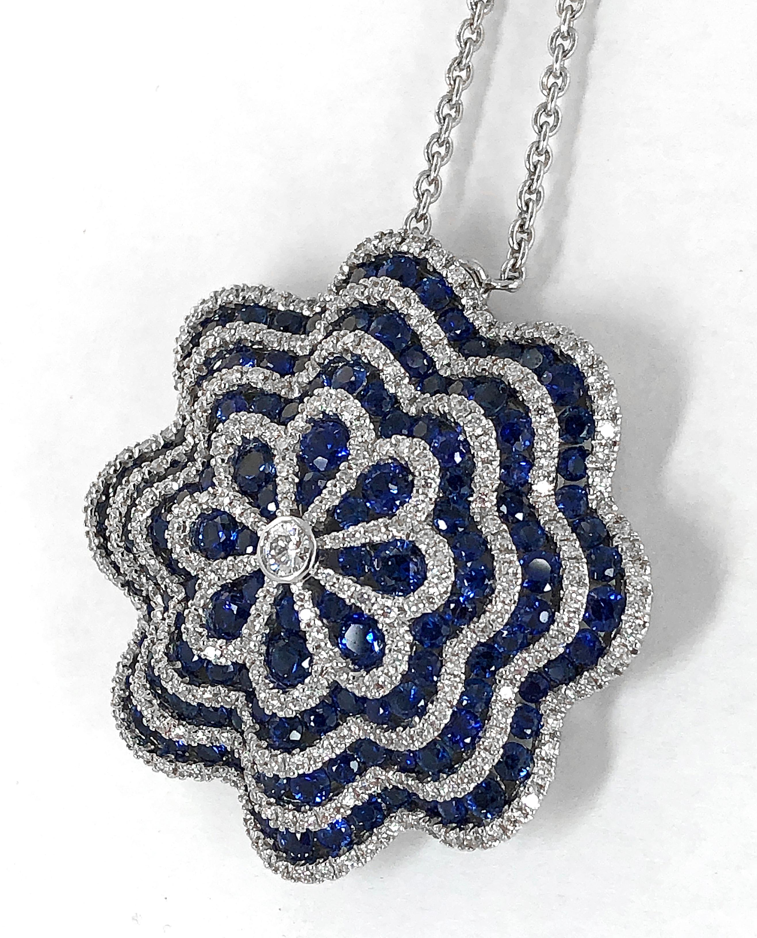 Vintage 18k white gold diamond and sapphire pendant necklace signed Salavetti.
Sapphire weighing approx. 7.11 cts.