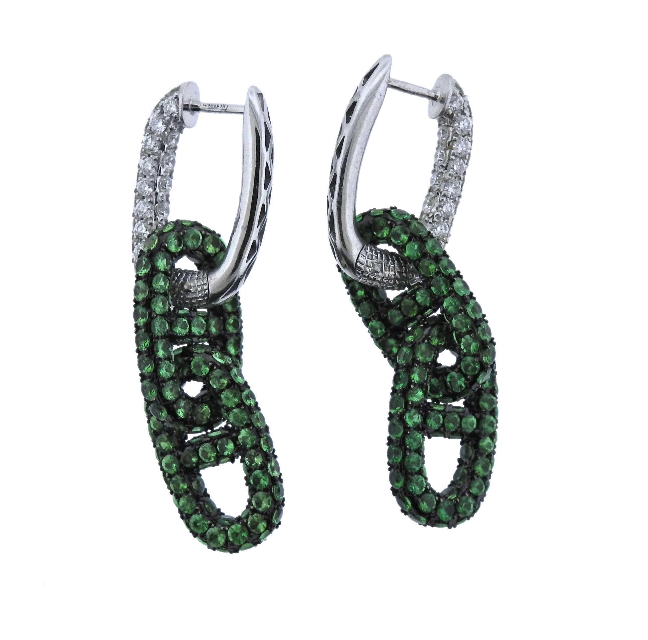  Pair of 18k white gold day & night link earrings, crafted by Salavetti, featuring removable tsavorite garnet drops and top hoops set with approx. 1.78ctw in G/VS diamonds. Earrings can be worn with tsavorite drops, or without.  With drops - 47mm