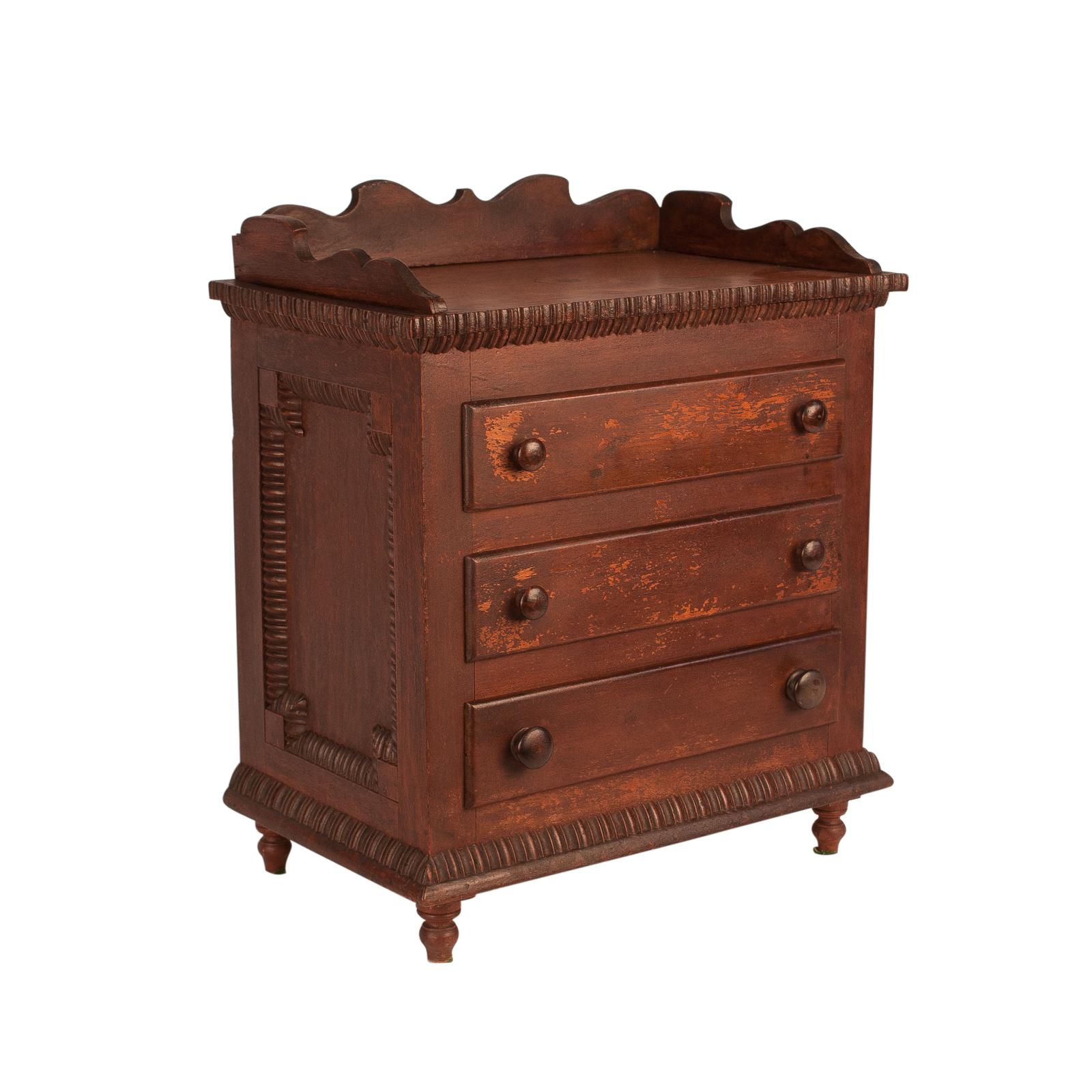 A late 19th century American salesman sample Tramp Art chest of drawers, circa 1890.