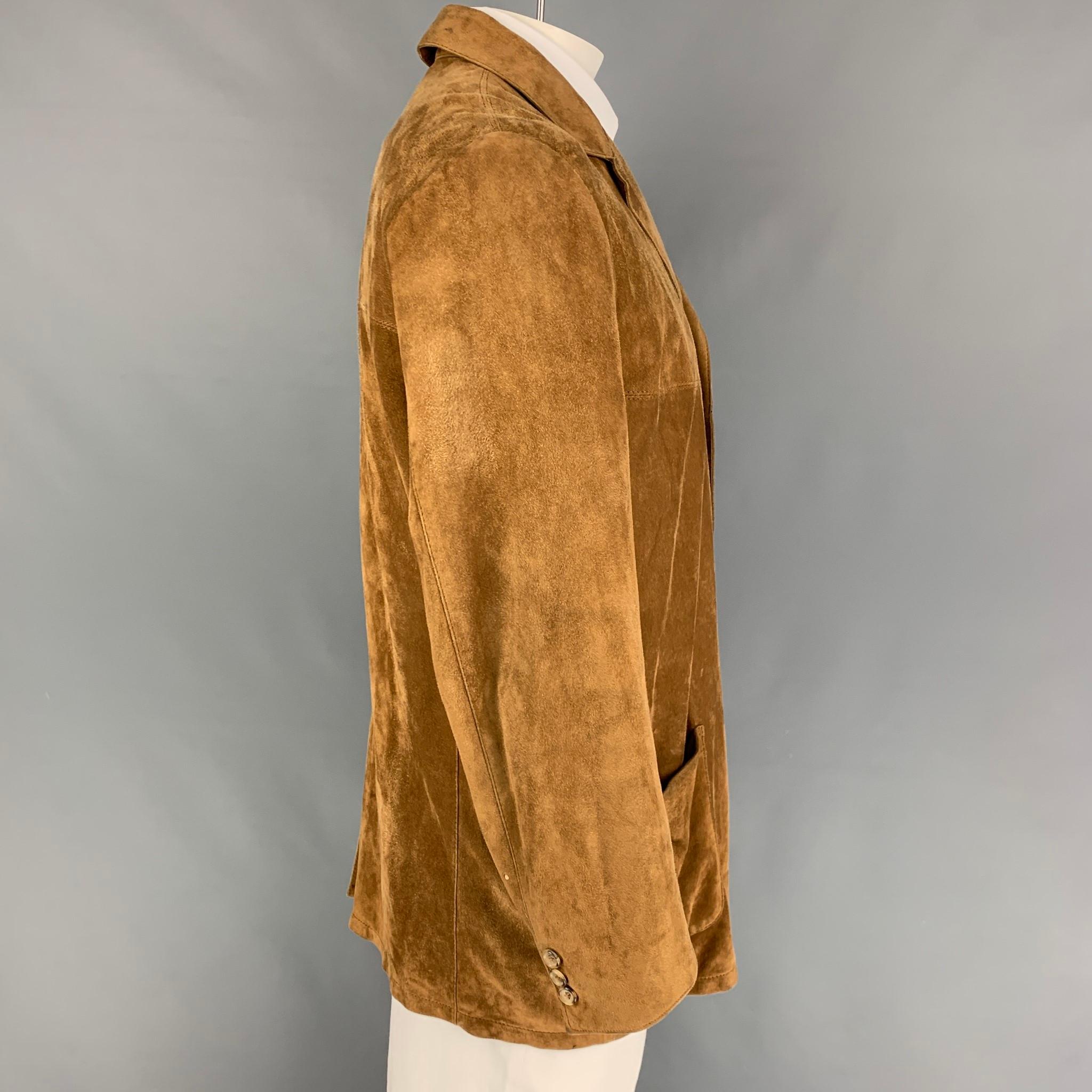 SALFRA for BERGDORF GOODMAN sport coat comes in a tan suede with a full liner featuring a notch lapel, patch pockets, single back vent, and a buttoned closure. Made in Italy. 

Very Good Pre-Owned Condition.
Marked: 56

Measurements:

Shoulder: 19.5