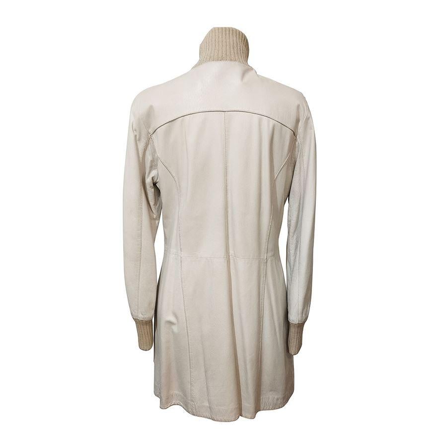 Leather White color Zip closure Four pockets Fur internal Length shoulder / hem cm 82 (32,2 inches) Shoulder cm 42 (16,5 inches)