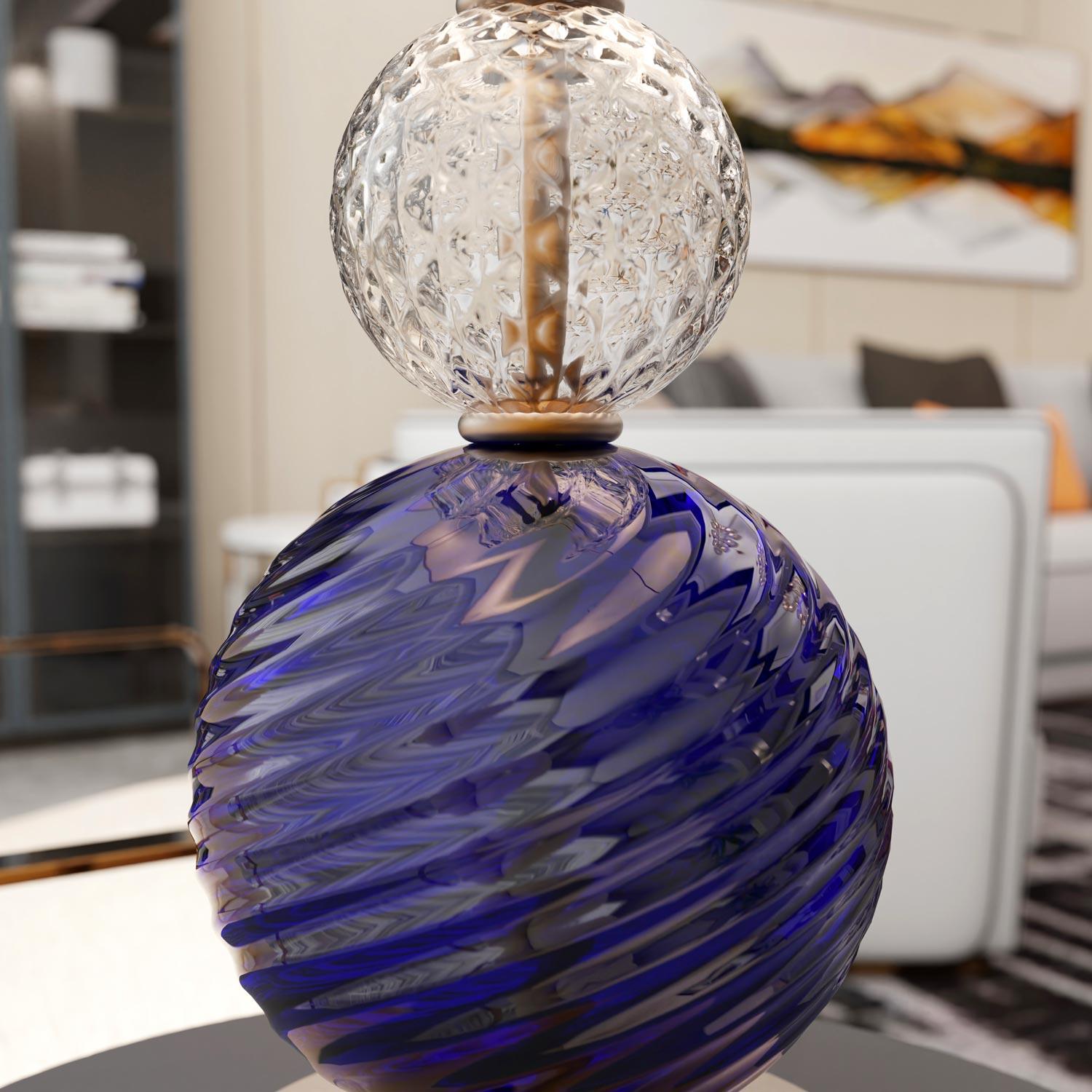Salieri is a table lamp with a Led light.
Refined design for a modern lamp made of blown glass.

This lighting creation is completely handmade by Master Glassmakers according to ancient and secret traditions handed down from father to son for
