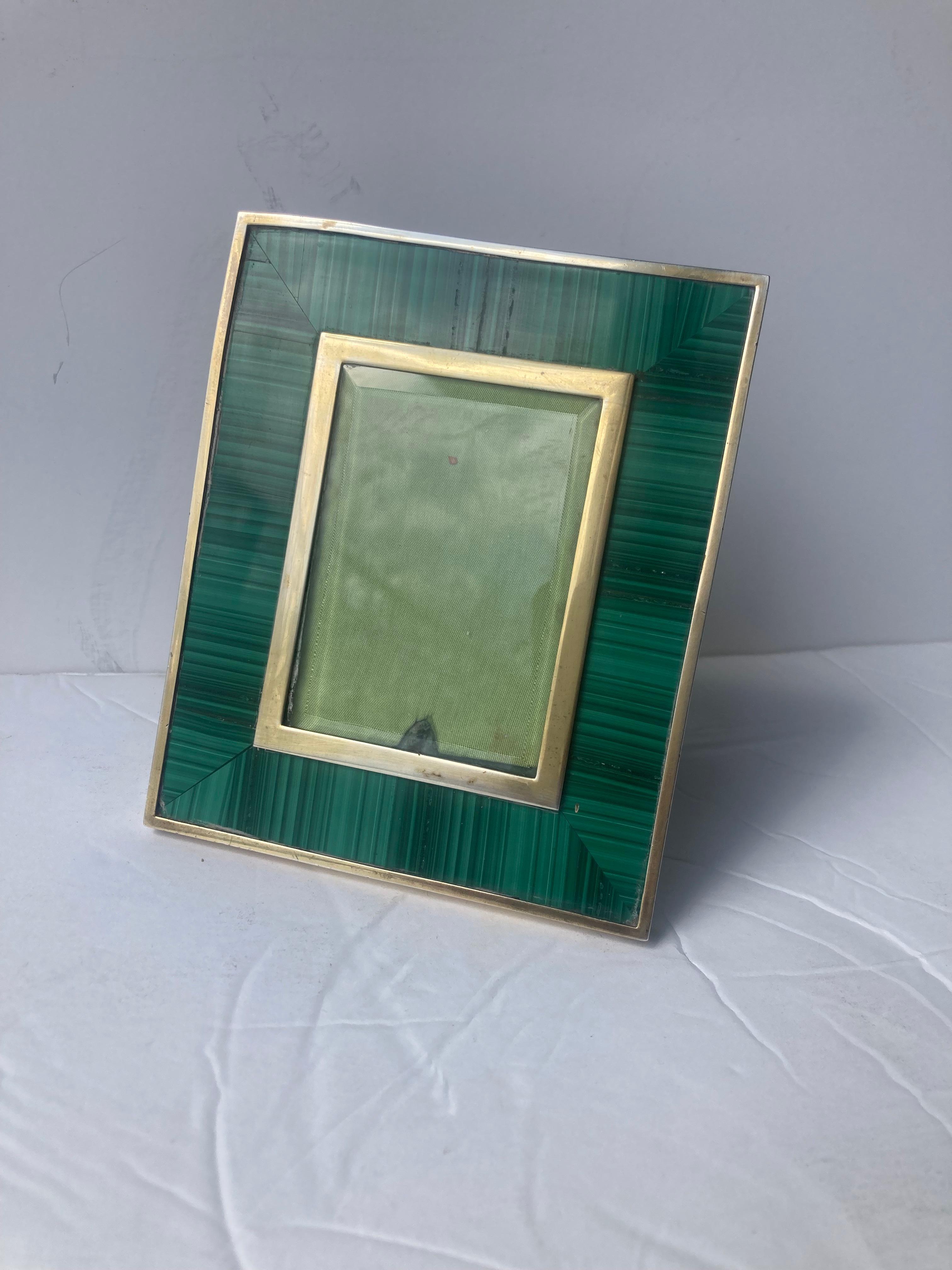 Beautiful luxury picture frame in malachite and gold wash sterling silver. The picture window measure  3x2 inches. Marked in bottom as shown ,Made in Italy and (star) 391 FI , as Firenze and designers mark and .925, 