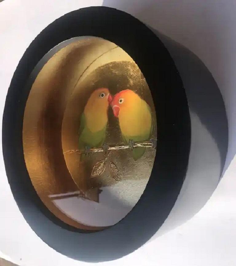 Two Love Birds iii is a unique pastel drawing surrounded by golden leaf. The piece is displayed in a circular, handcrafted, black lacquered frame. The work is 31cm diameter and 10cm deep.

ADDITIONAL INFORMATION:
Dutch Metal Leaf, Gold Paint, Mixed