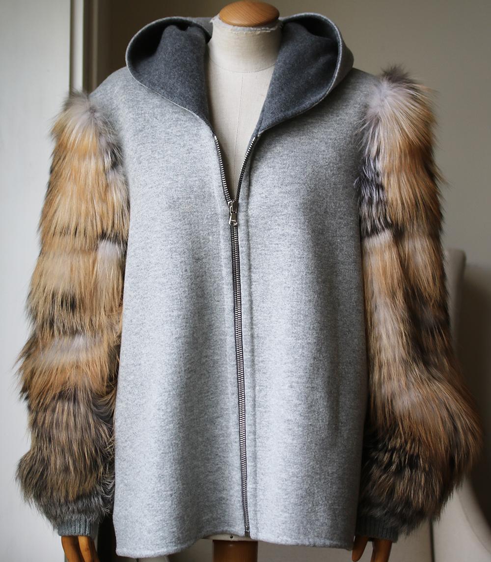 This Sally LaPointe sweatshirt hooded cardigan features a fox fur sleeves and collarless neckline. Fox fur sleeves. Collarless neckline. 29% Polyamide, 24% wool, 23% viscose, 20% polyester, 4% cashmere. 100% Real fox fur.

Size: Medium (UK 10, US 6,