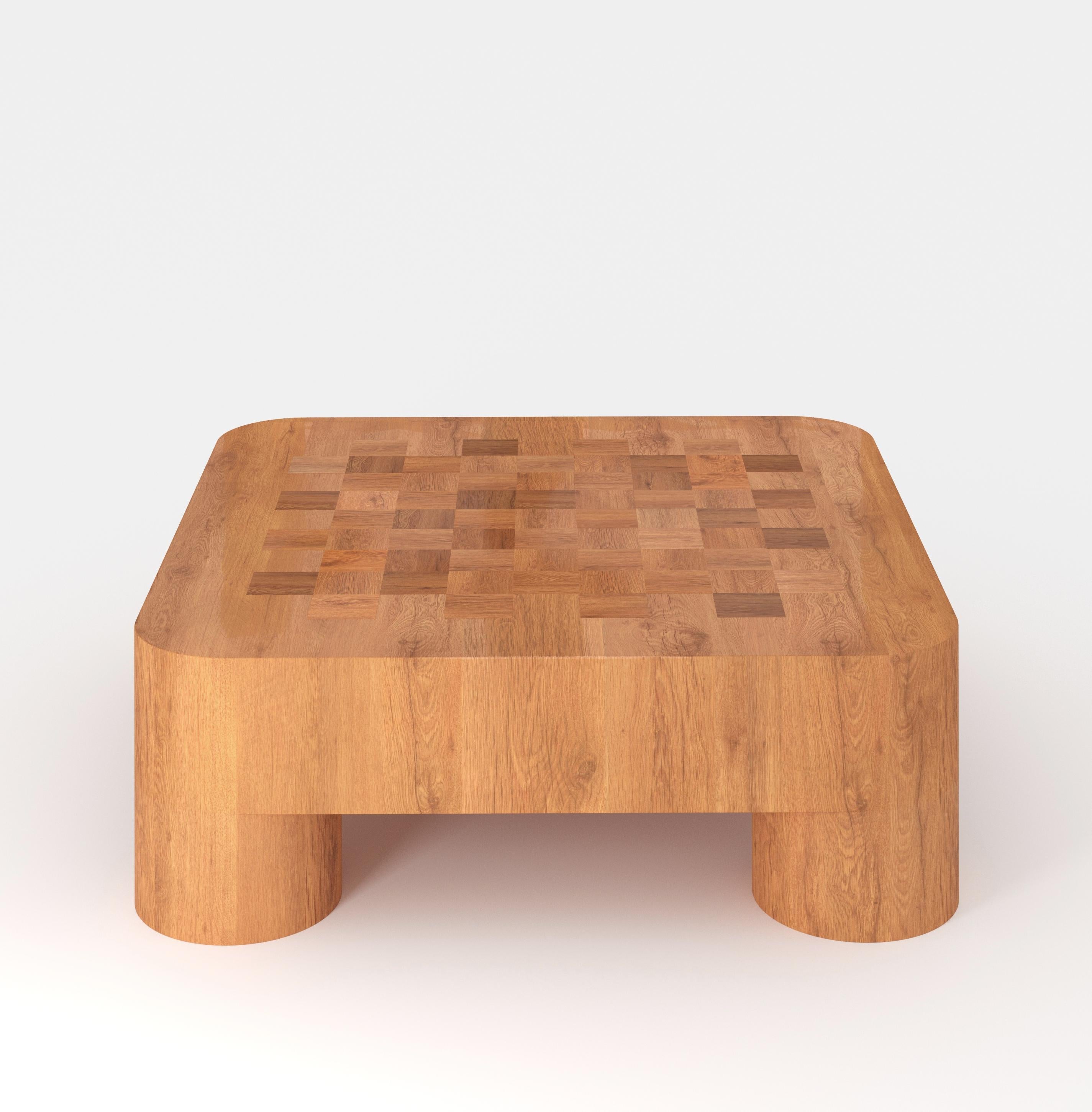 A chunky coffee table that looks as solid as the solid Oak wood it's made of, but with a delicate Marquetry top in reclaimed Oak from Chianti wine barrels. 

Sizes and materials are fully customizable.

About Fred&Juul:

Fred&Juul renew traditions
