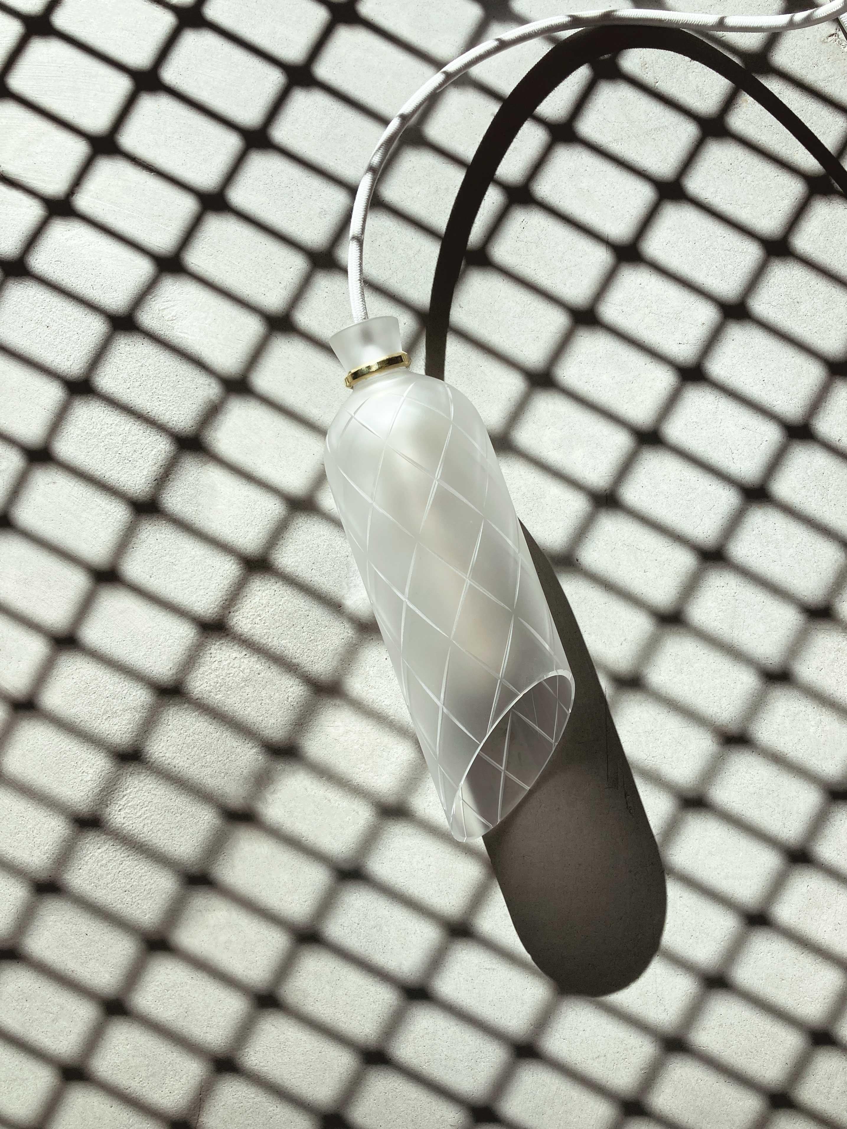 Salma lamp by Kickie Chudikova
Limited Edition of 20 pieces - 10 in Stock
Made to order - Crystal glass, handmade in Czech Republic.
Sold as single pendant or arrangement of 3 or 5 pieces.
Dimensions: D 8 x H 26 cm
Materials: Glass,