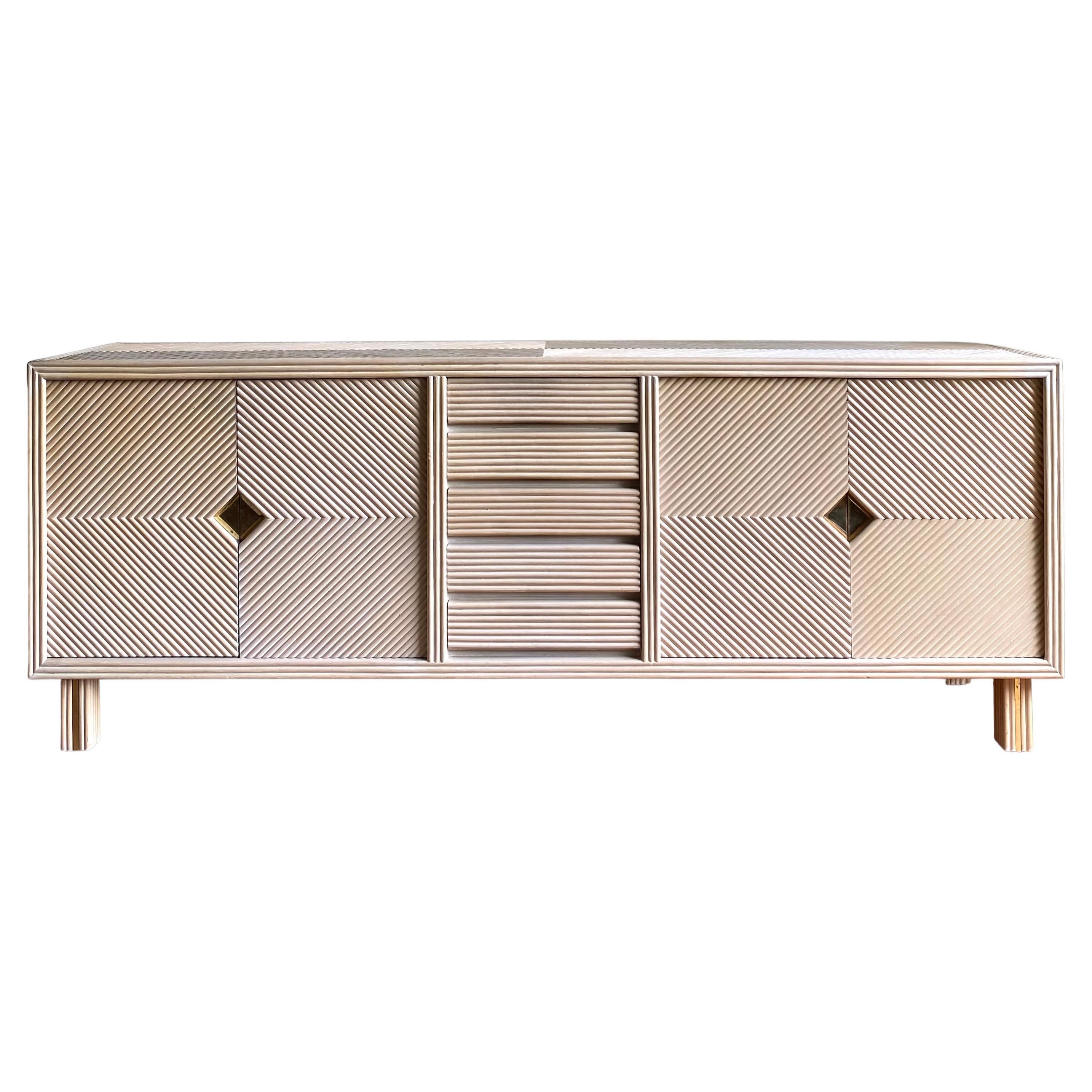 Salmon Colored Sideboard with pencil reed Brass look accents, circa 1970s For Sale
