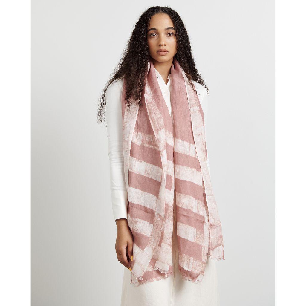 An effortless classic style statement, Salmon is a beautiful linen scarf, adds modern elegance and timeless quality as an accessory which can be used suitably for personal / workwear or as a travel accessory. The seams of this linen scarf are