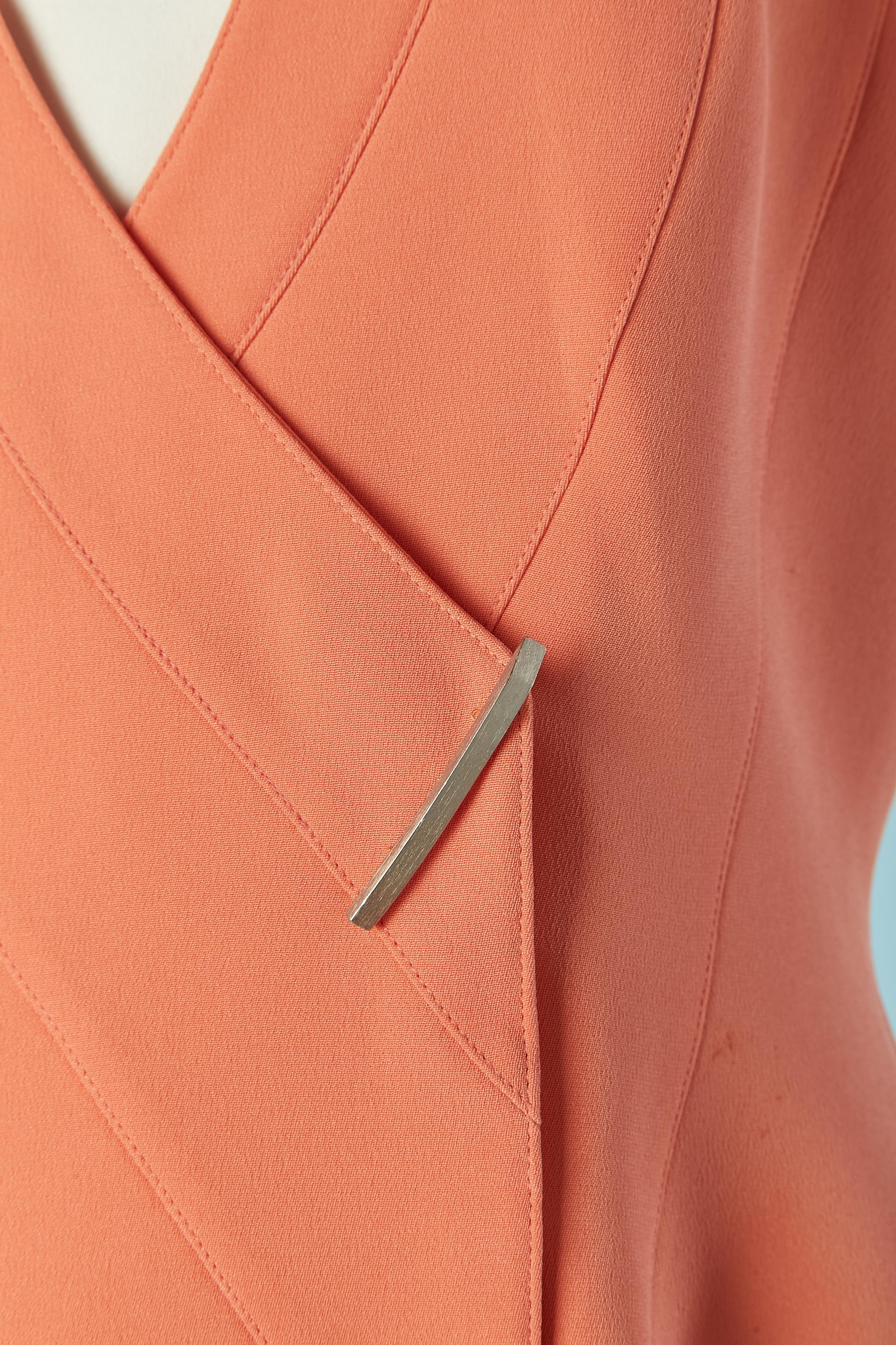 Salmon pink skirt suit with cut-work . Main fabric composition: 60% acetate, 40% silk. Lining: 100% acetate. 
A Triangle of white satin is snaped on the middle front inside the neck-line, like a  