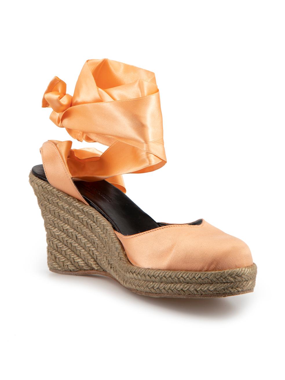CONDITION is Very good. Minimal wear to espadrilles is evident. Minimal pulls to satin on toe cap of this used Sonia Rykiel designer resale item.



Details


Salmon orange

Satin

Espadrille wedges

Round-toe

Ribbon wrap around lace-up