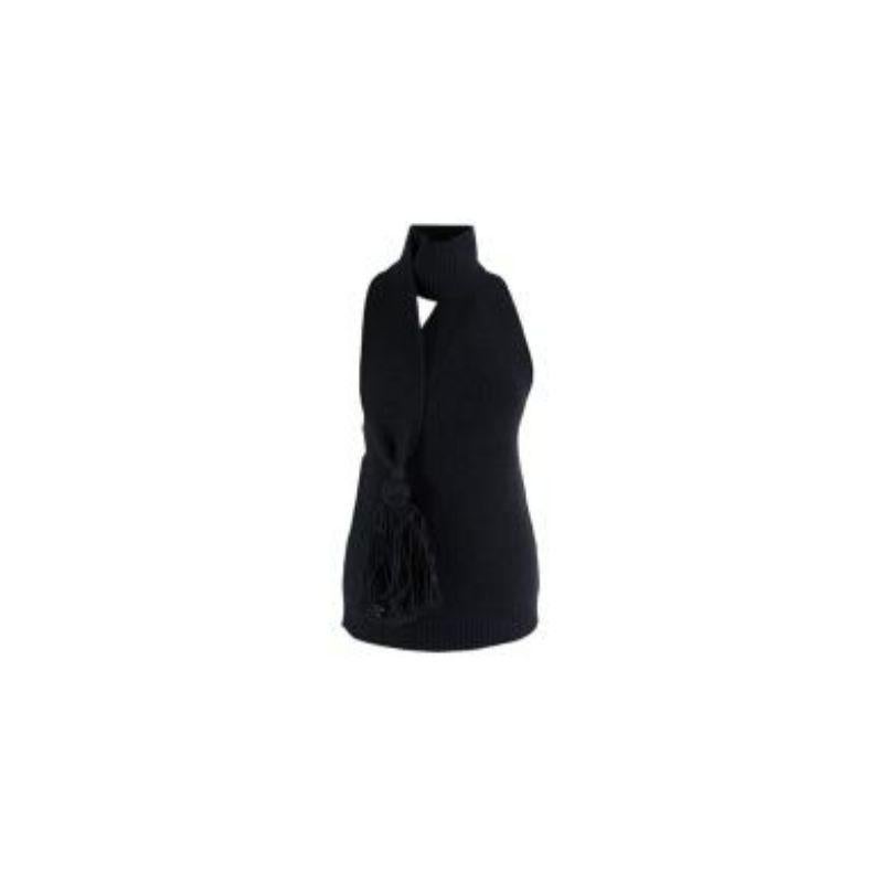 Bottega Veneta Black Wool Knitted Top & Skirt
 
 
 
 - Part of Salon 02 
 
 - Mid black knit body 
 
 - Wrap scarf top with pom pom detail 
 
 - Sleeveless 
 
 - A line skirt 
 
 - Gathered back skirt panel 
 
 
 
 Material:
 
 100% Wool 
 
 
 
