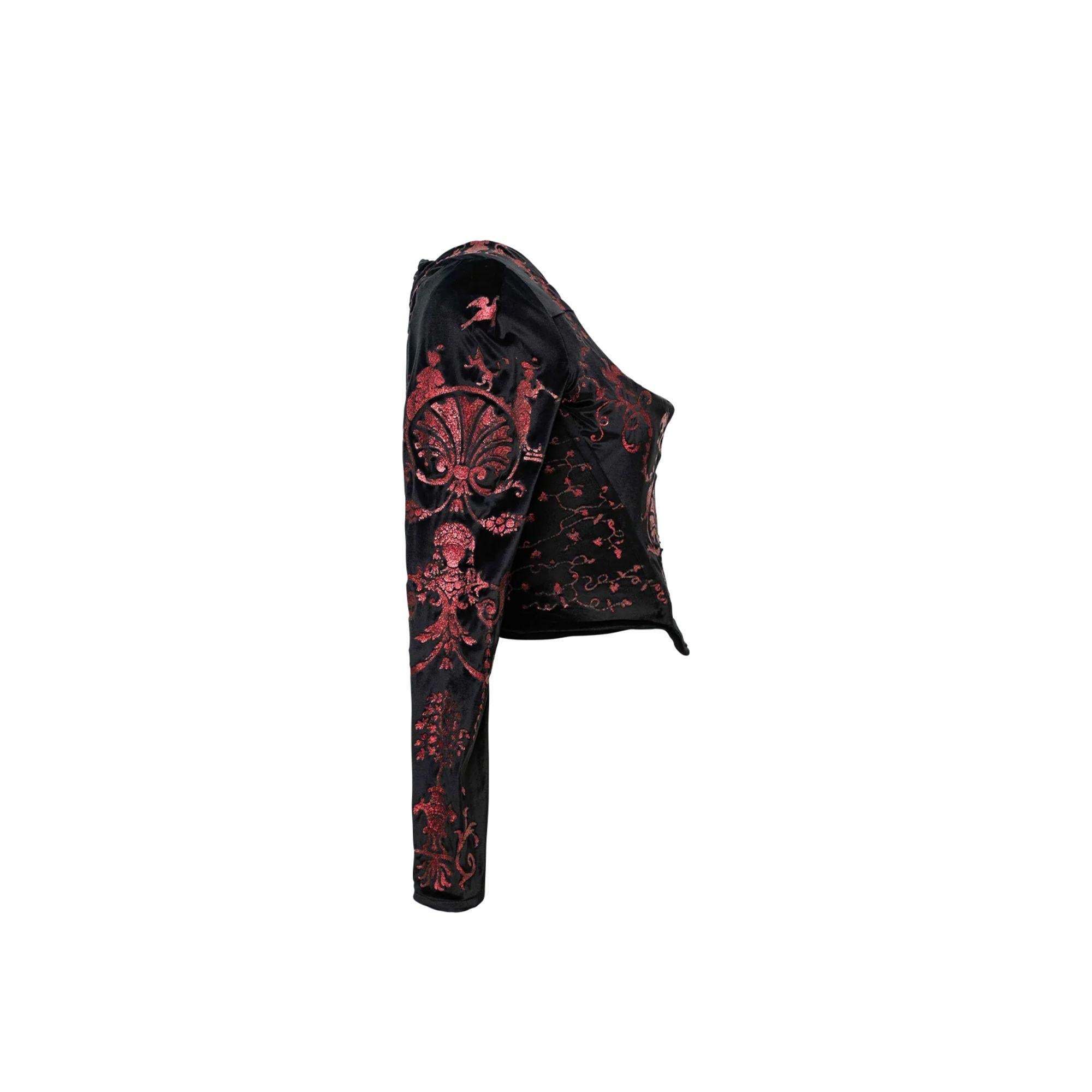S/S 1992 Red Label Vivienne Westwood ‘Salon’ Collection black voided velvet corset with pink metallic-stencilled details. Neoclassical printed ‘Boulle’ designs inspired by the Mirror with Marquetry by Andre-Charles Boulle (1713). Back zip enclosure,