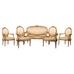 Salon Set  in Giltwood Comprising Four Armchairs and One Sofa 
