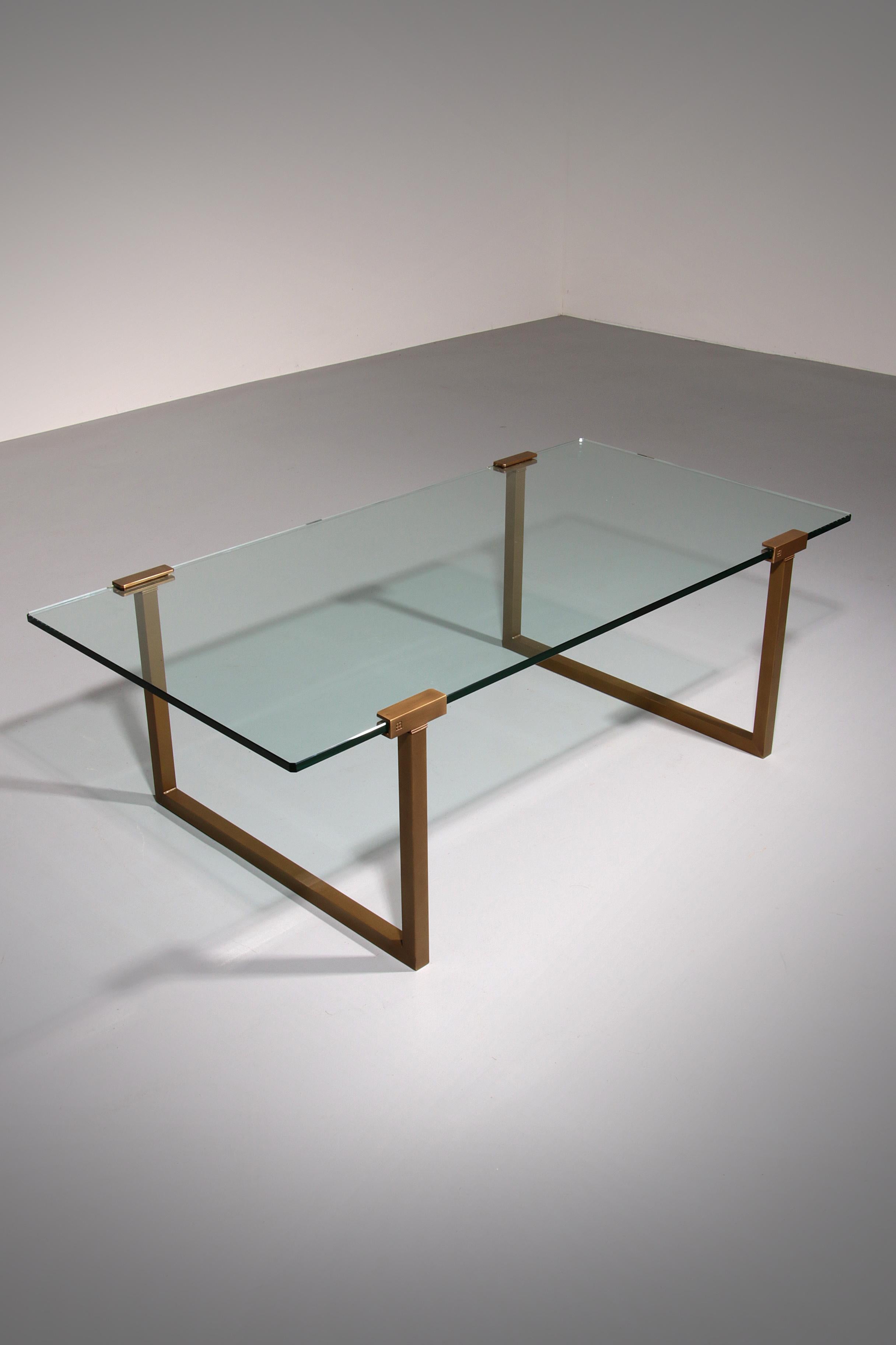 

The T54 side table, designed by renowned designer Peter Ghyczy and produced in the Netherlands, exemplifies timeless sophistication and structural excellence. Its sleek frame, crafted from square tubes, is seamlessly connected to the tabletop with