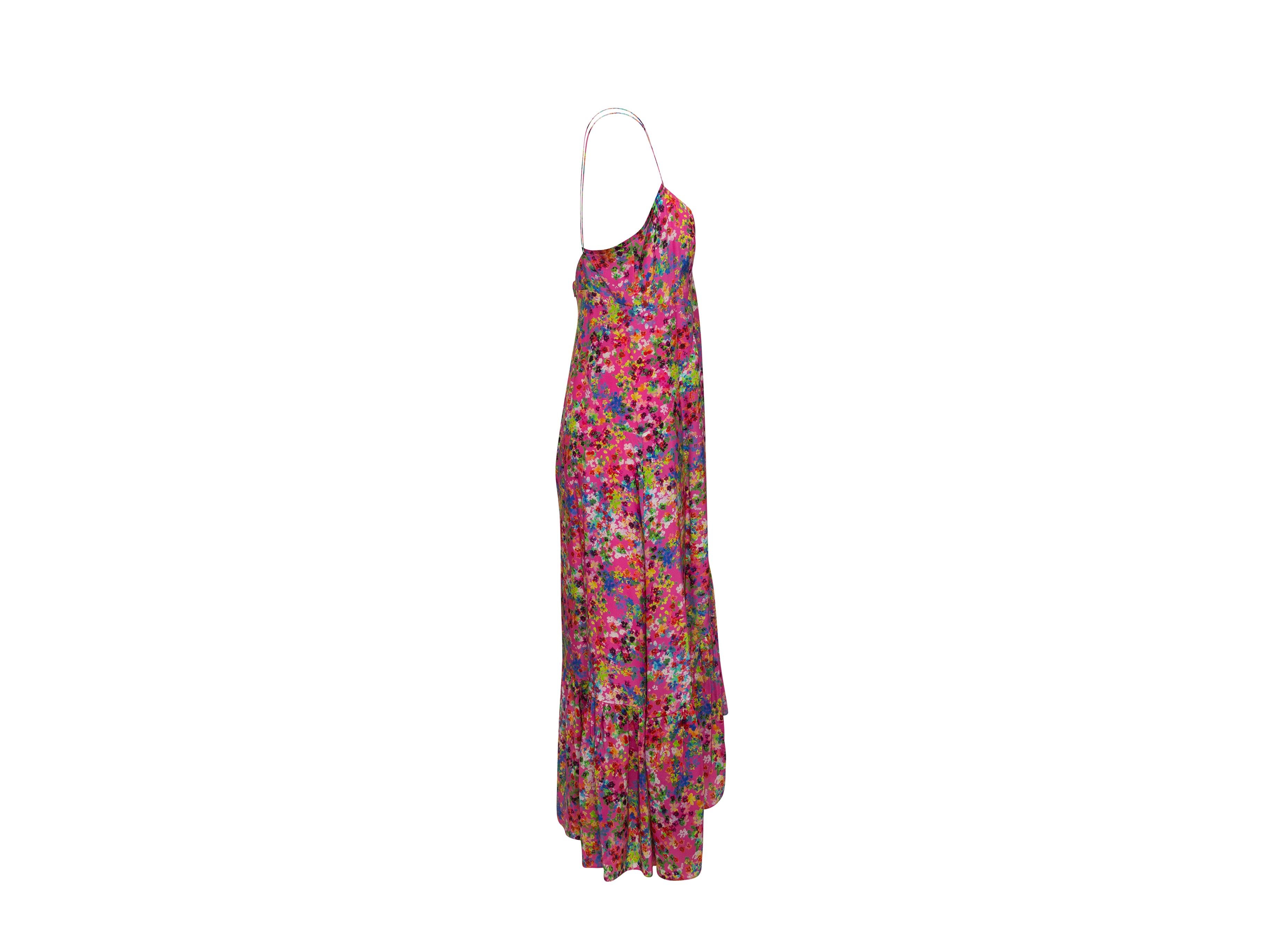 Product details: Fuchsia and multicolor silk sleeveless maxi dress by Saloni. Floral print throughout. V-neck. Narrow straps. Asymmetrical hem. 34