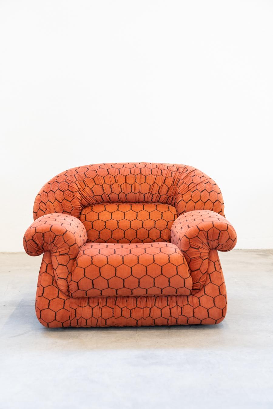 Vintage living room, club style, consisting of 3-seater sofa and 2 armchairs, 				1970s
Very good conditions
Manufactured from orange fabric, embellished with hexagonal patterns in 	every part of them.  
Sofa: H78 x W220 x D100
Armchair: H80 x W110