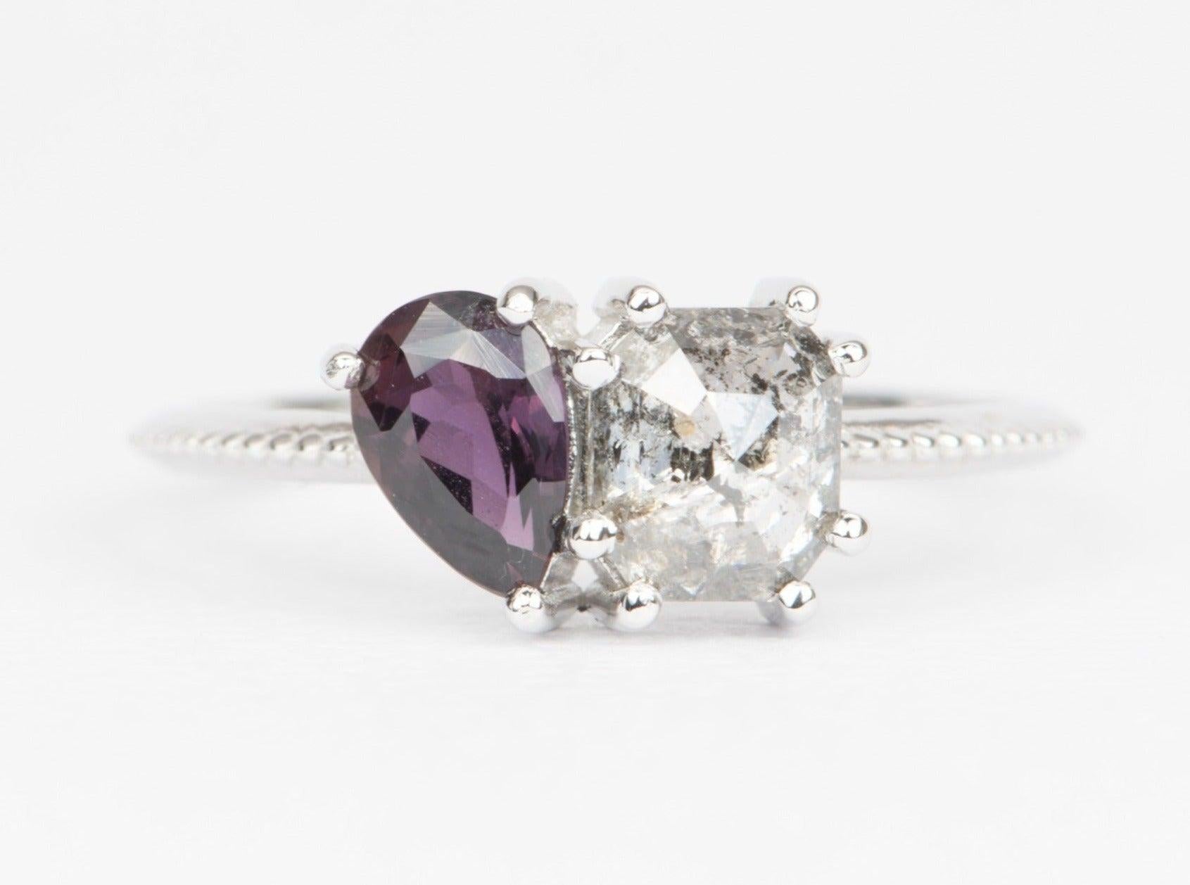 ♥ Solid 14k white gold salt and pepper diamond and Montana sapphire you and me ring
♥ The item measures 7.3 mm in length, 11.2 mm in width, and stands 4.7 mm from the finger
♥ The Montana sapphire has an uncommon color that is purplish red

♥ US