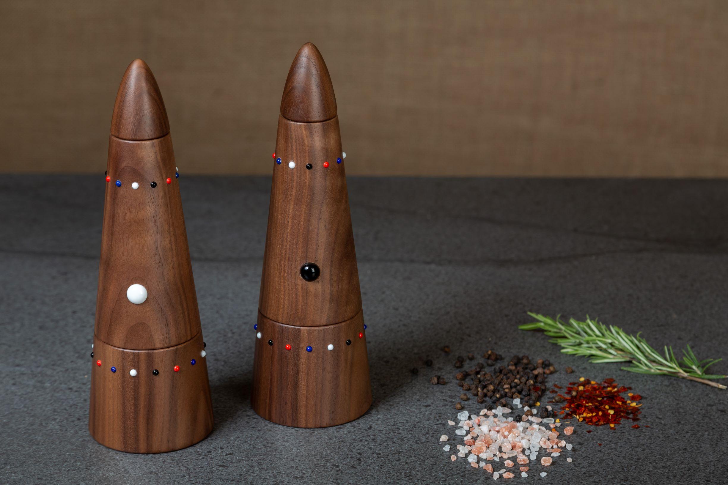 The SoShiro Pok collection salt mill and pepper grinder set is crafted from walnut wood, embedded with glass pearl beads, and fitted with all-ceramic, non-oxidizing or corroding grinding mechanisms offering 14 granular size settings.

The Pok