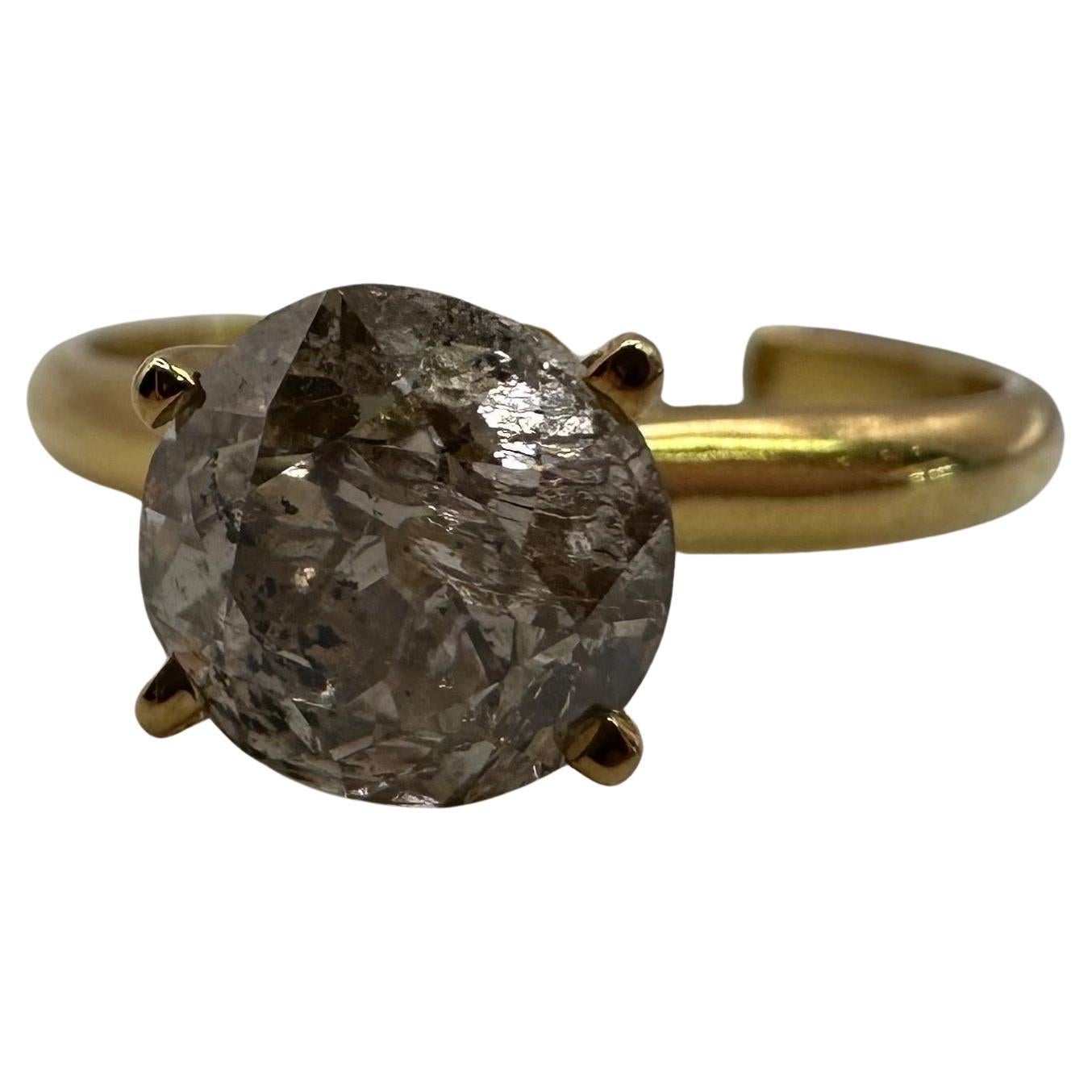 Interesting diamond ring with a center diamond often called salt and pepper or galaxy for its unique pattern inside the diamond. This ring is a size 6.5 and can be re-sized.
Metal Type: 14KT
Natural Side Diamond(s):
Color: H
Cut:Round