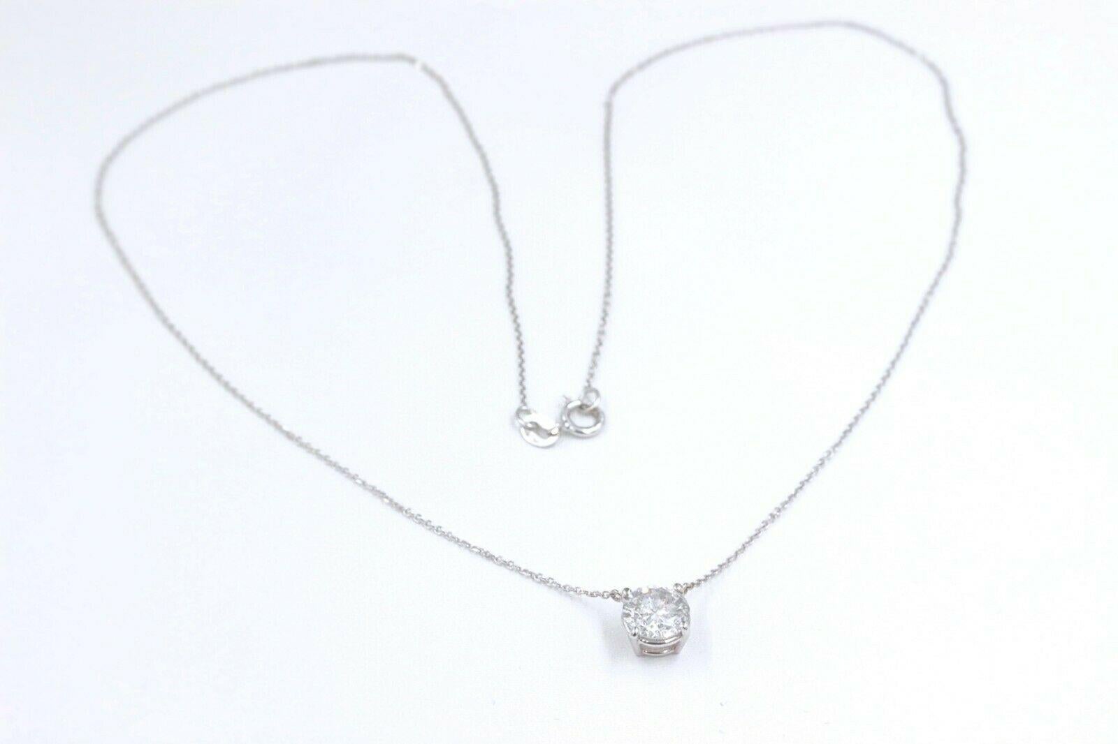 Salt & Pepper Diamond Pendant Necklace

Style:  Solitaire Pendant
Metal:  14k White Gold
Size:  Chain 16' 
Width:  7 MM X 8 MM
Total Carat Weight:  1.31 cts
Diamond Shape:  Round Cut 
Diamond Color:  Salt & Pepper G color
Clarity:  I1
Hallmark: 