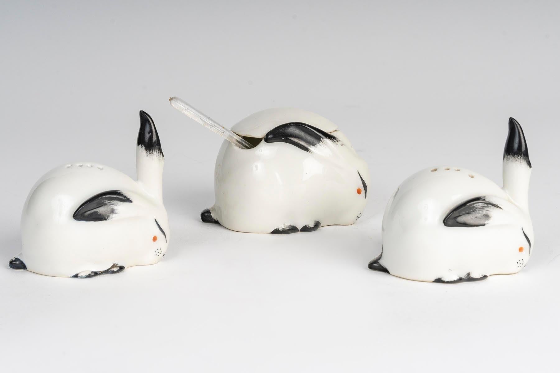 Saltcellar, pepperpot, mustard pot by Sandoz, Haviland porcelain, 20th century.

Haviland porcelain saltcellar, pepperpot and mustard pot by Sandoz, 20th century.
Large: H: 6cm, D: 8cm
Small: H: 6cm, D: 6cm