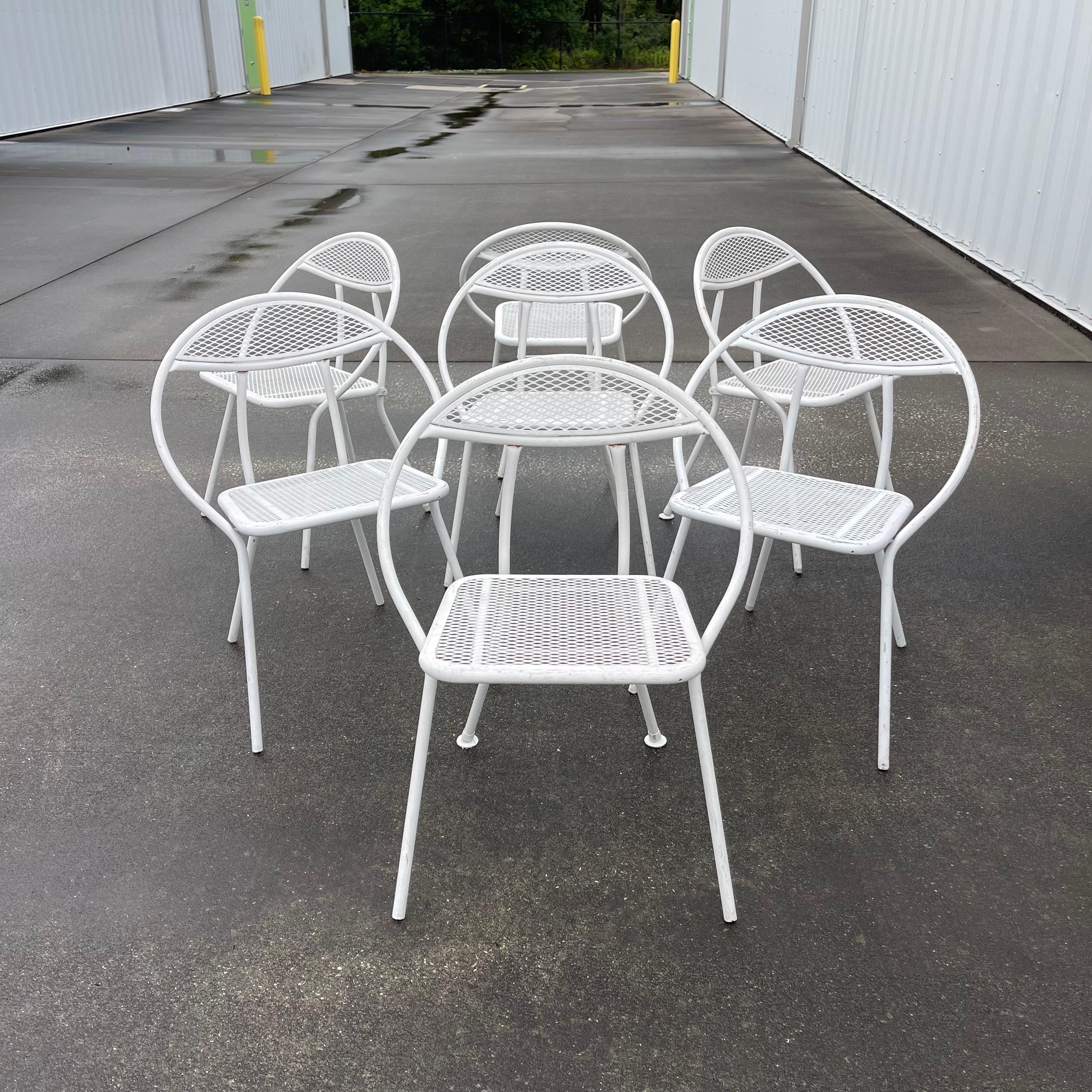 Fabulous hoop back folding metal patio chairs.