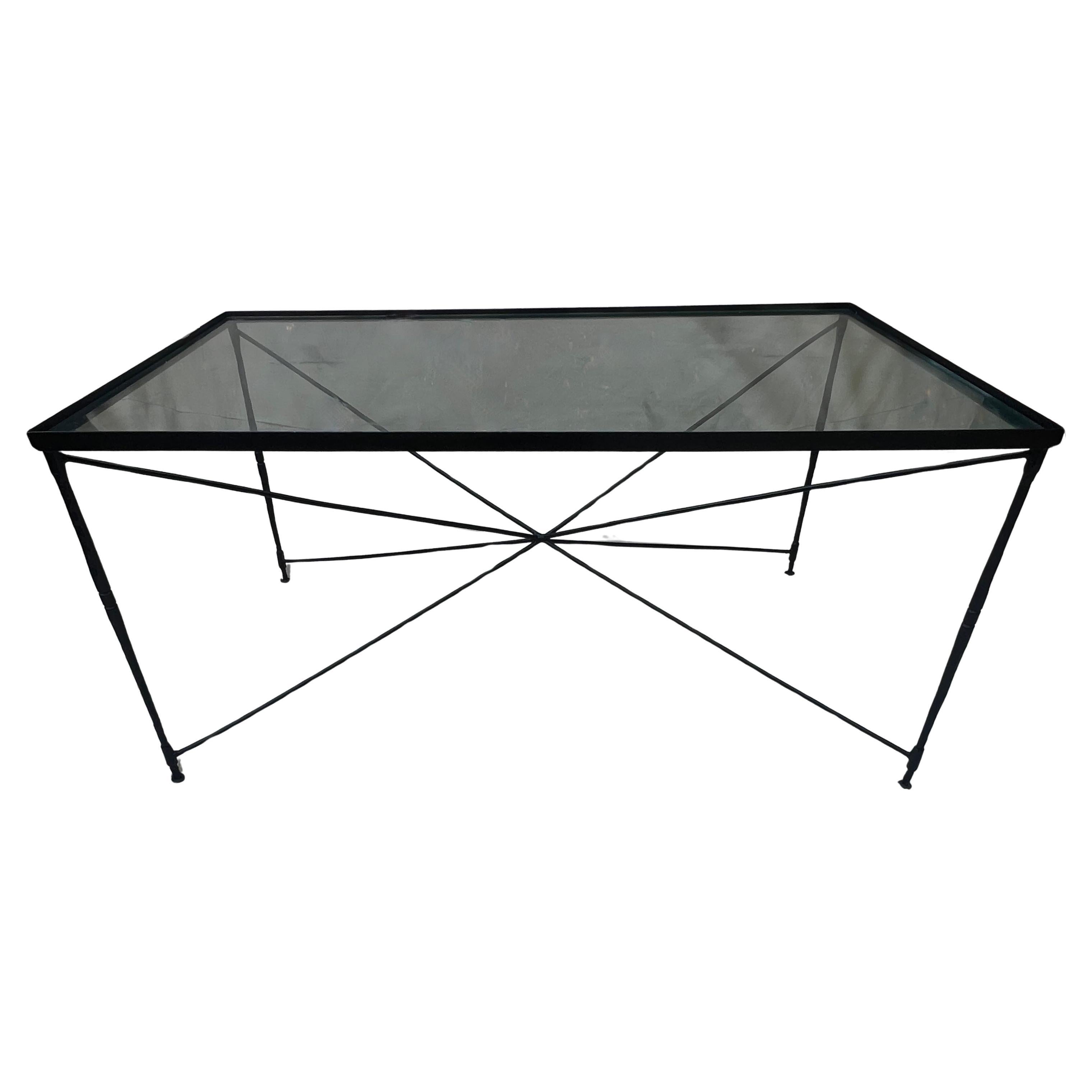A beautifully handcrafted wrought iron dining table by renowned designer and manufacturer Salterini. This table was designed by Italian designer, Mario Papperzini, Expertly welded and hand-hammered, the table features Salterini and Papperzini's