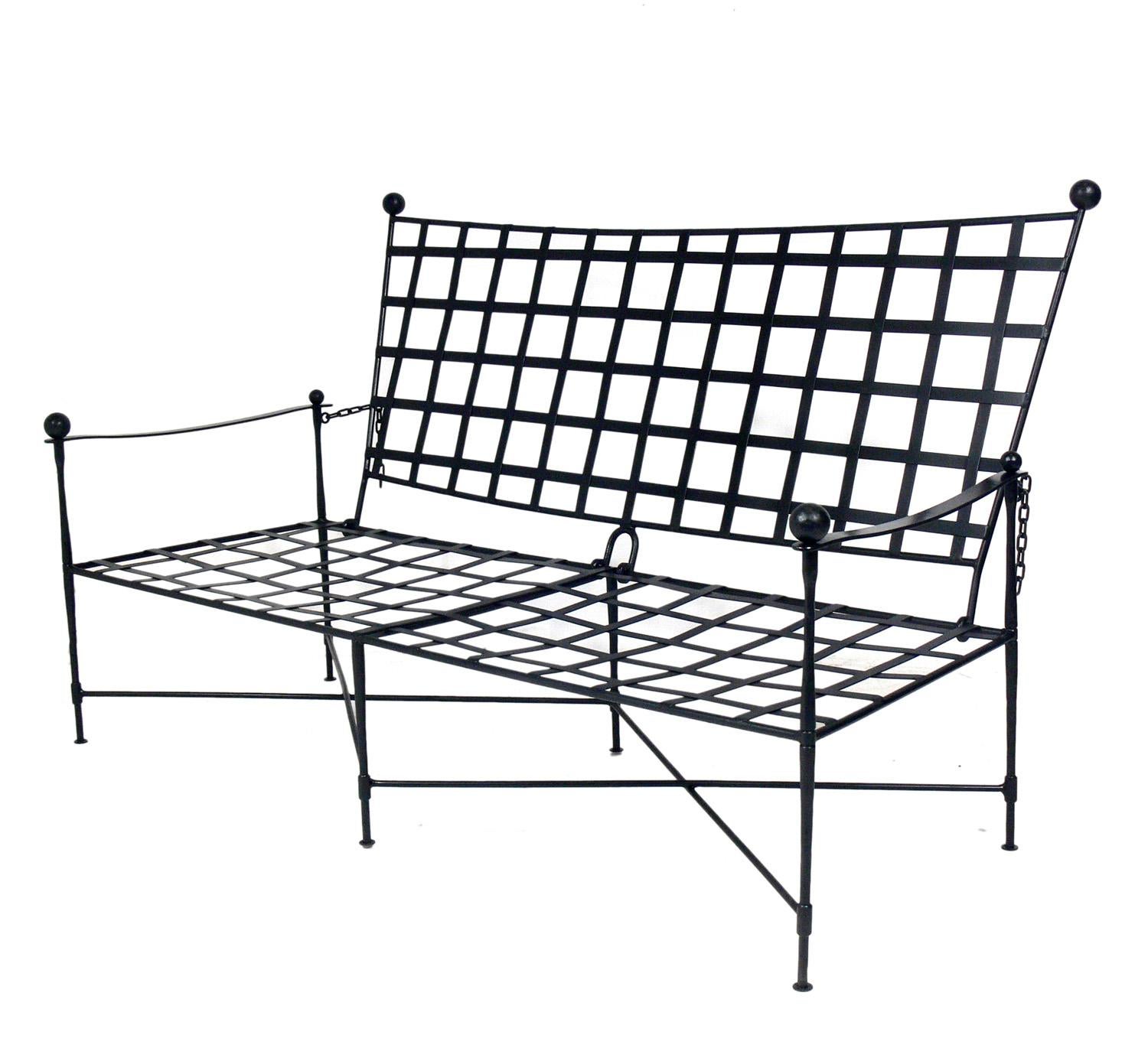 Iron settee or sofa, design attributed to Mario Papperzini for Salterini, Italian, circa 1950s. This is a versatile form and it can be used indoors or outdoors. This sculptural design was used by Yves Saint Laurent in his personal residence at la