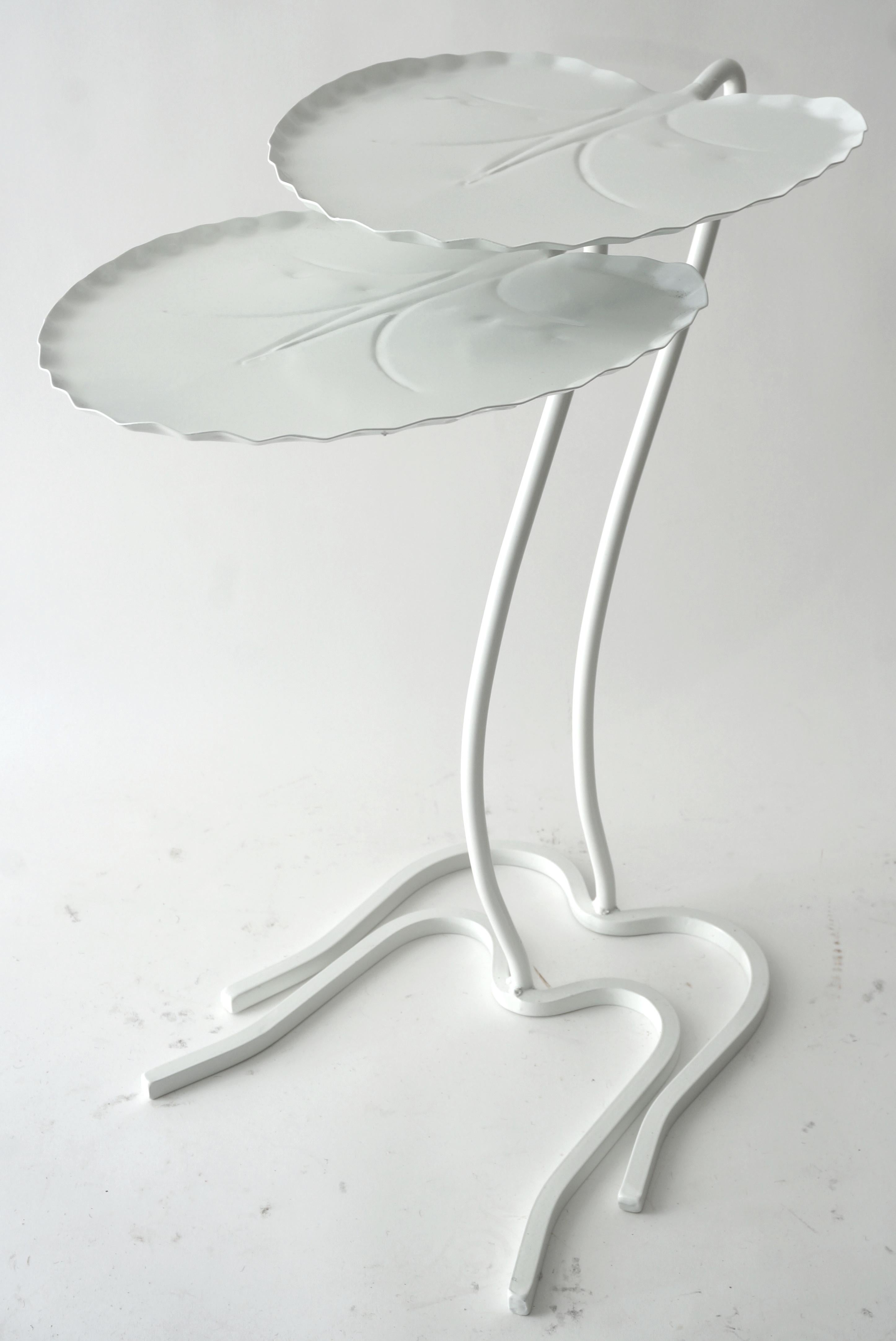 
This stylish, chic and iconic set of Salterini lily pad tables date to the 1960s-1970s and they will make a statement around the pool, or perhaps your garden room.

Note: These pieces have been professionally sandblasted and powdercoated in the