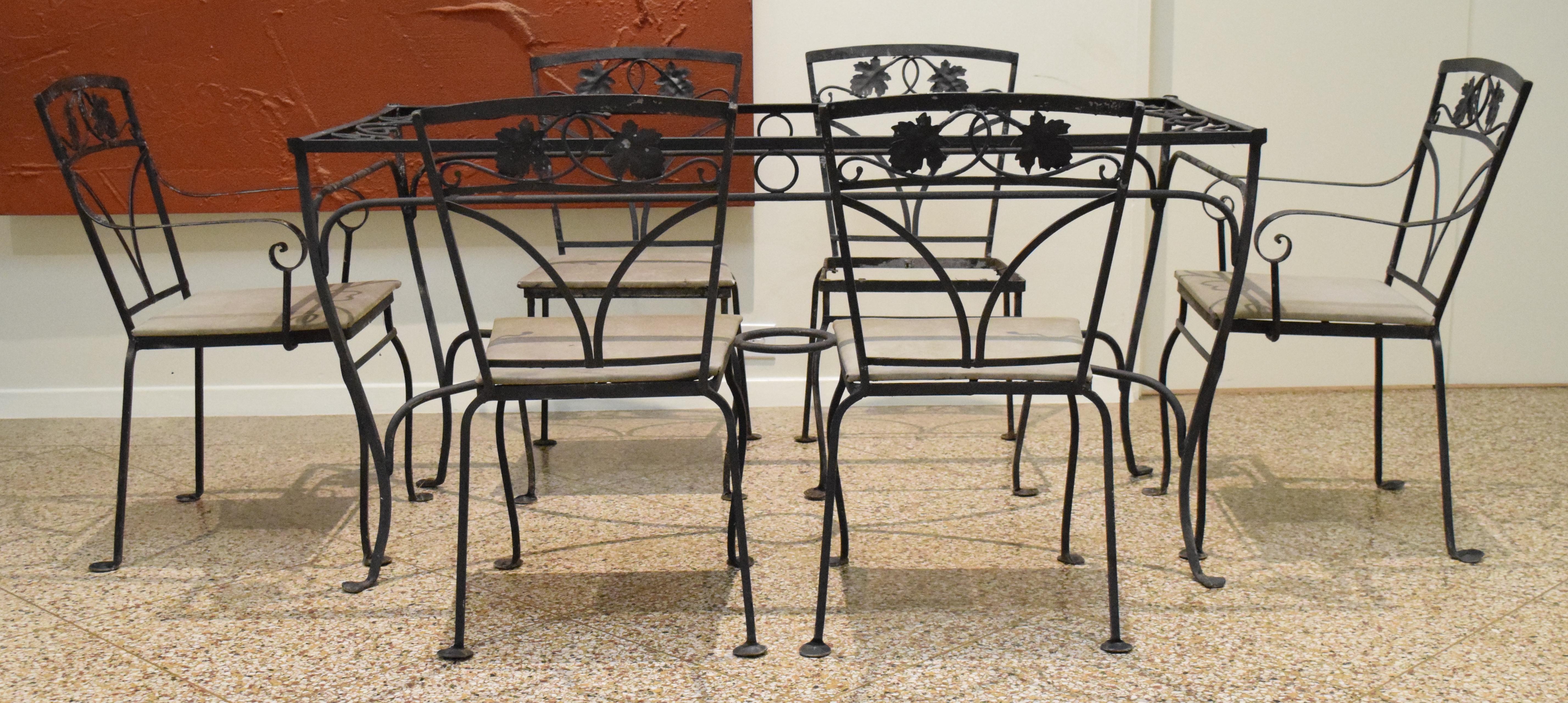 Beautiful seven piece patio set in the maple leaf group design. Includes table base, four armchairs and two-side chairs. 

Chair measurements as listed but armchair width is 20