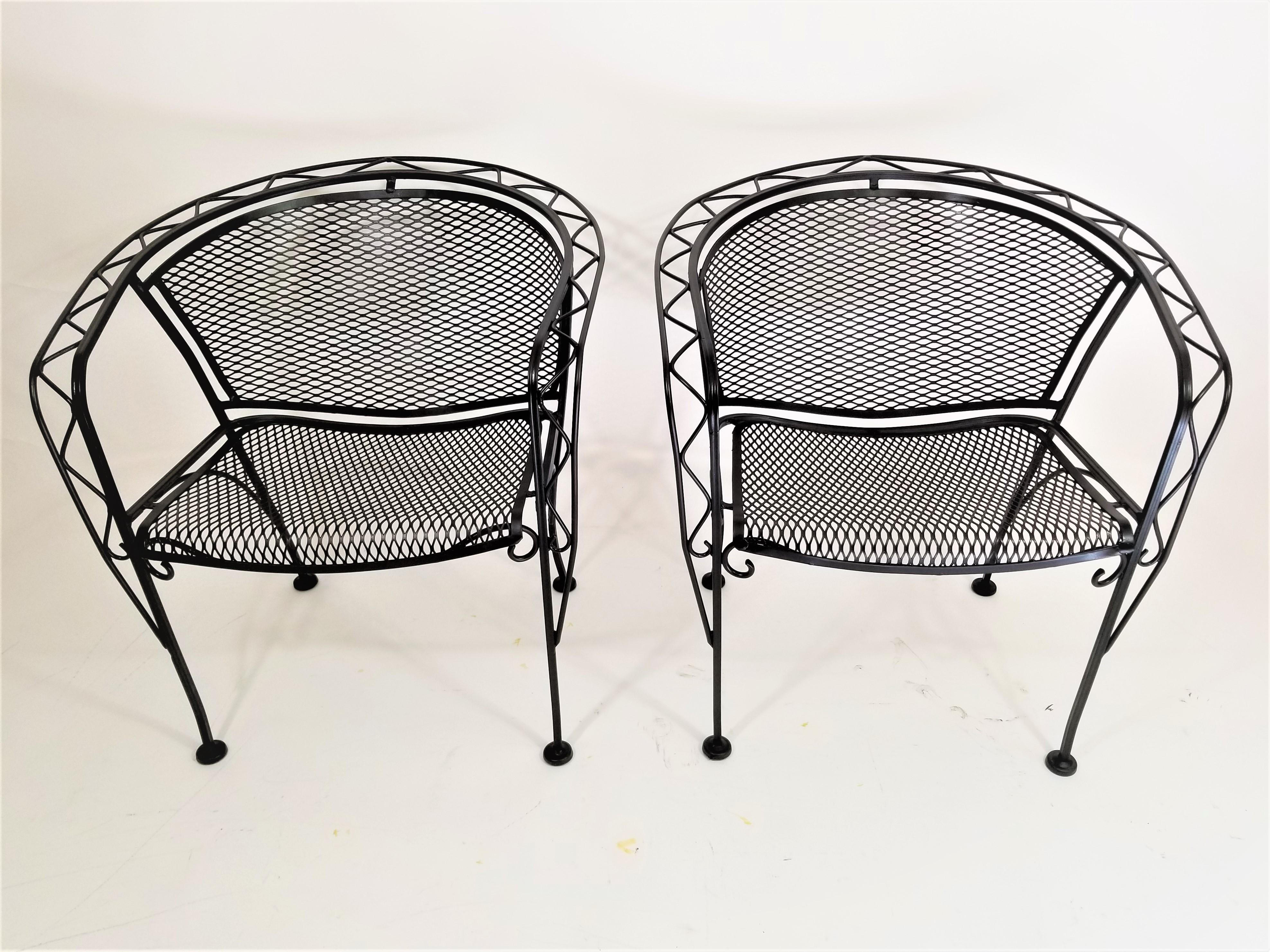 2 Pairs of midcentury 1950s Salterini wrought iron outdoor or patio chairs. Nice solid weight. 2 are Professionally restored and in excellent condition in black finish and 2 are unfinished.