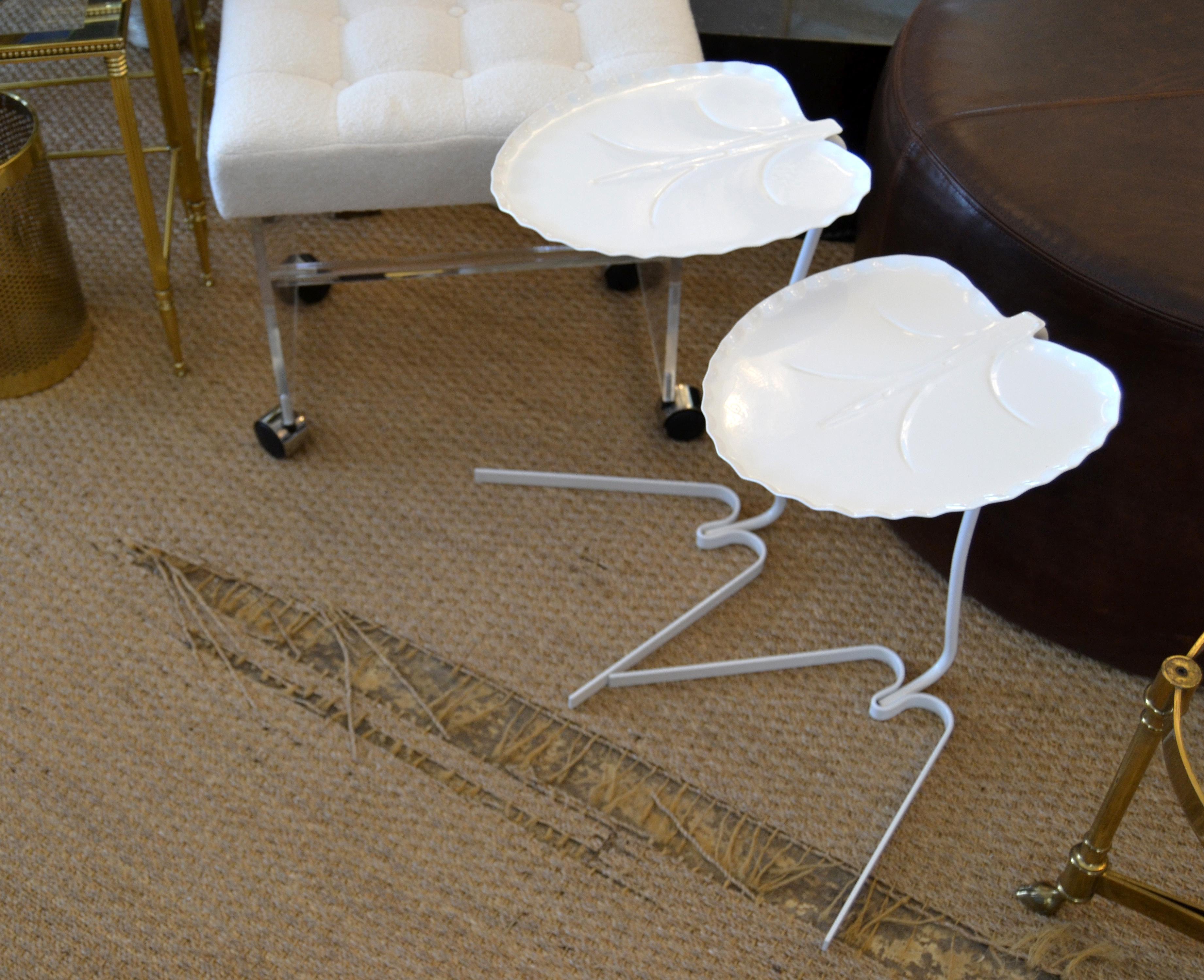 A pair of Mid-Century Modern graduated lily pad leaf side, end or nesting tables with new powder coated finish in white by John Salterini.
They can be used for indoors and outdoors for Your Patio.
Lovely as a drink table by a chaise lounge