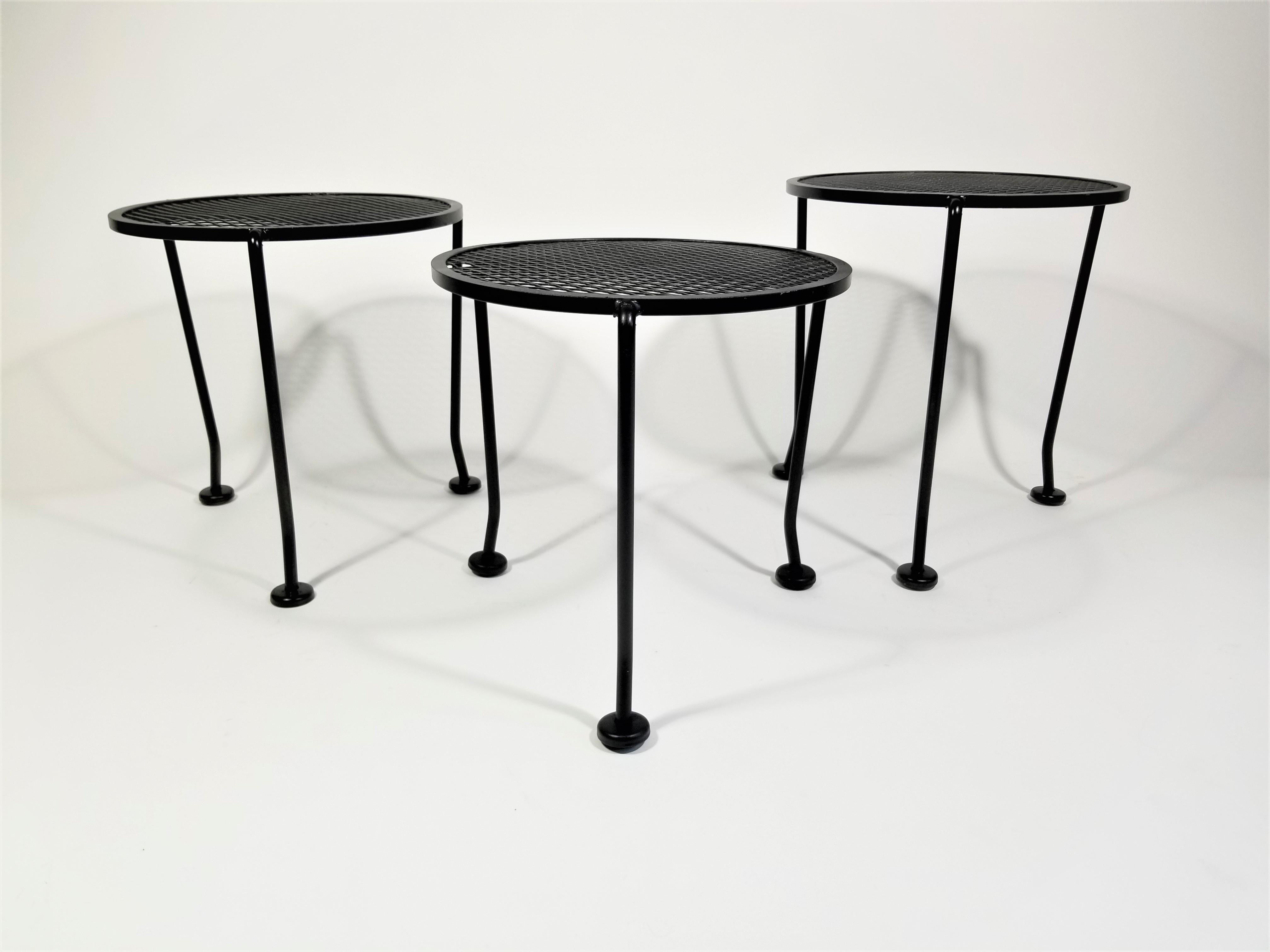 Set of 3 midcentury Salterini wrought iron nesting or stacking tables. Black finish. Outdoor garden patio tables. Perfect for a small space.
Measurements of Each Stool:
Largest Table Height - 16.25 inches, Top Diameter - 14.5 inches, 
Bottom