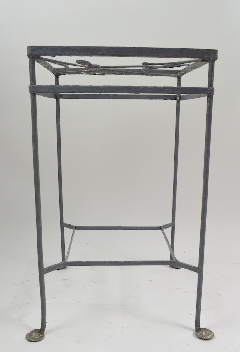 Rare Salterini table with original glass top (shows minor chips). Unusual and not often seen tall and narrow form, this example is currently in older grey paint finish usable as is or we offer custom powder coating if you want a more polished look.