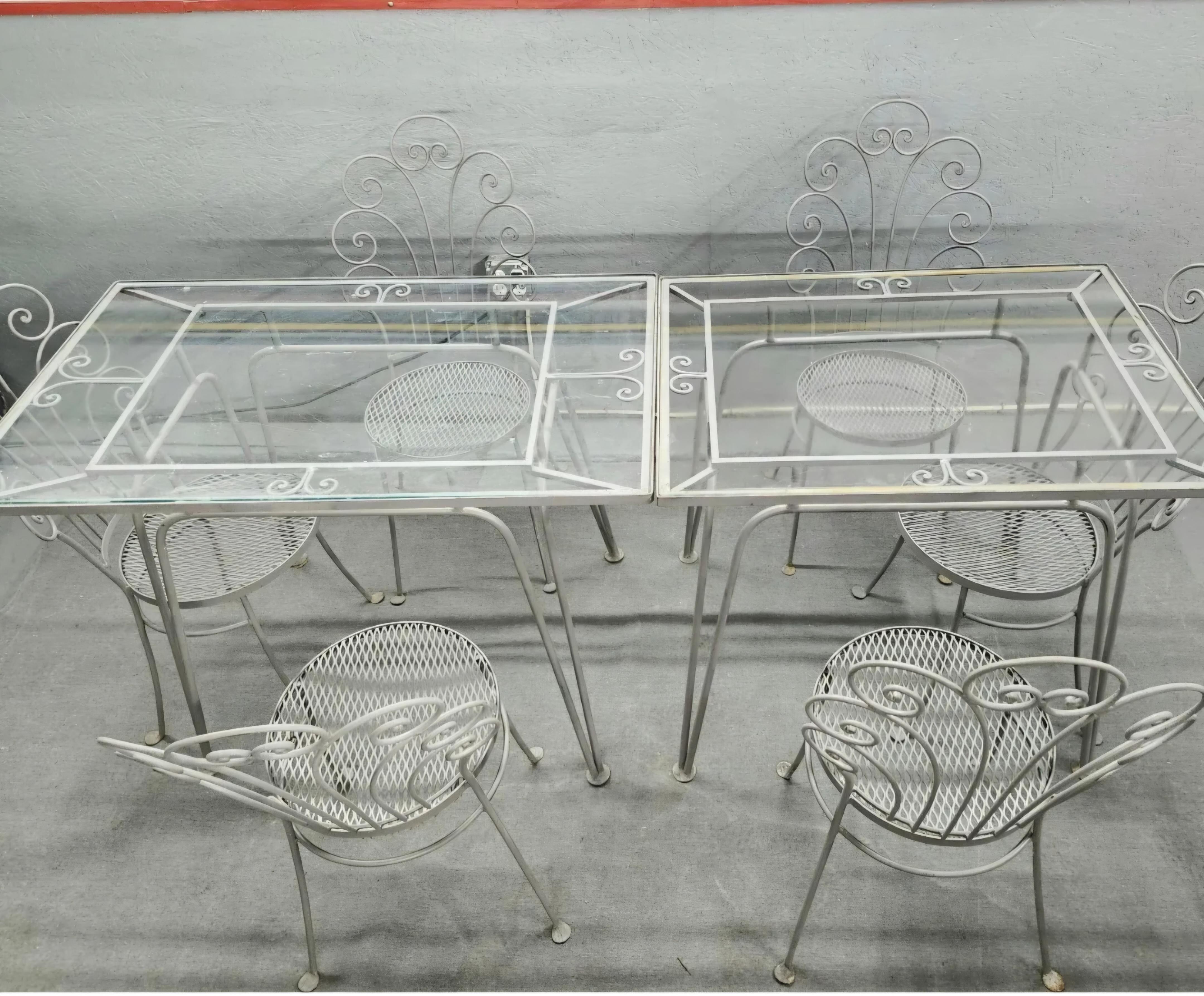 Salterini patio dining set 7 pieces.

Hard to find tables designed by Salterini. Seating for 6 people. Signature Salterini outward facing feet and scrolling motif. Enjoy this vintage wrought iron 7 piece dining set on your terrace, garden, or