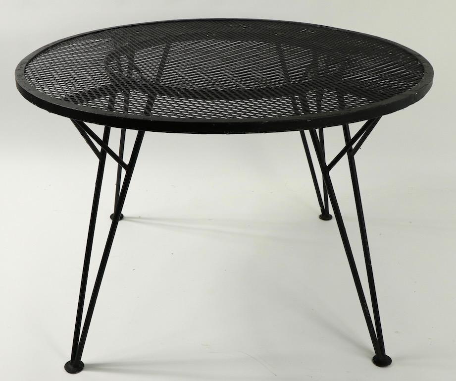 Hard to find form from the Radar Series by Tempestini for Salterini. The table is in older black paint finish, which shows normal wear, consistent with age. Originally designed for outdoor use, also suitable for use indoors. Use as is or we can