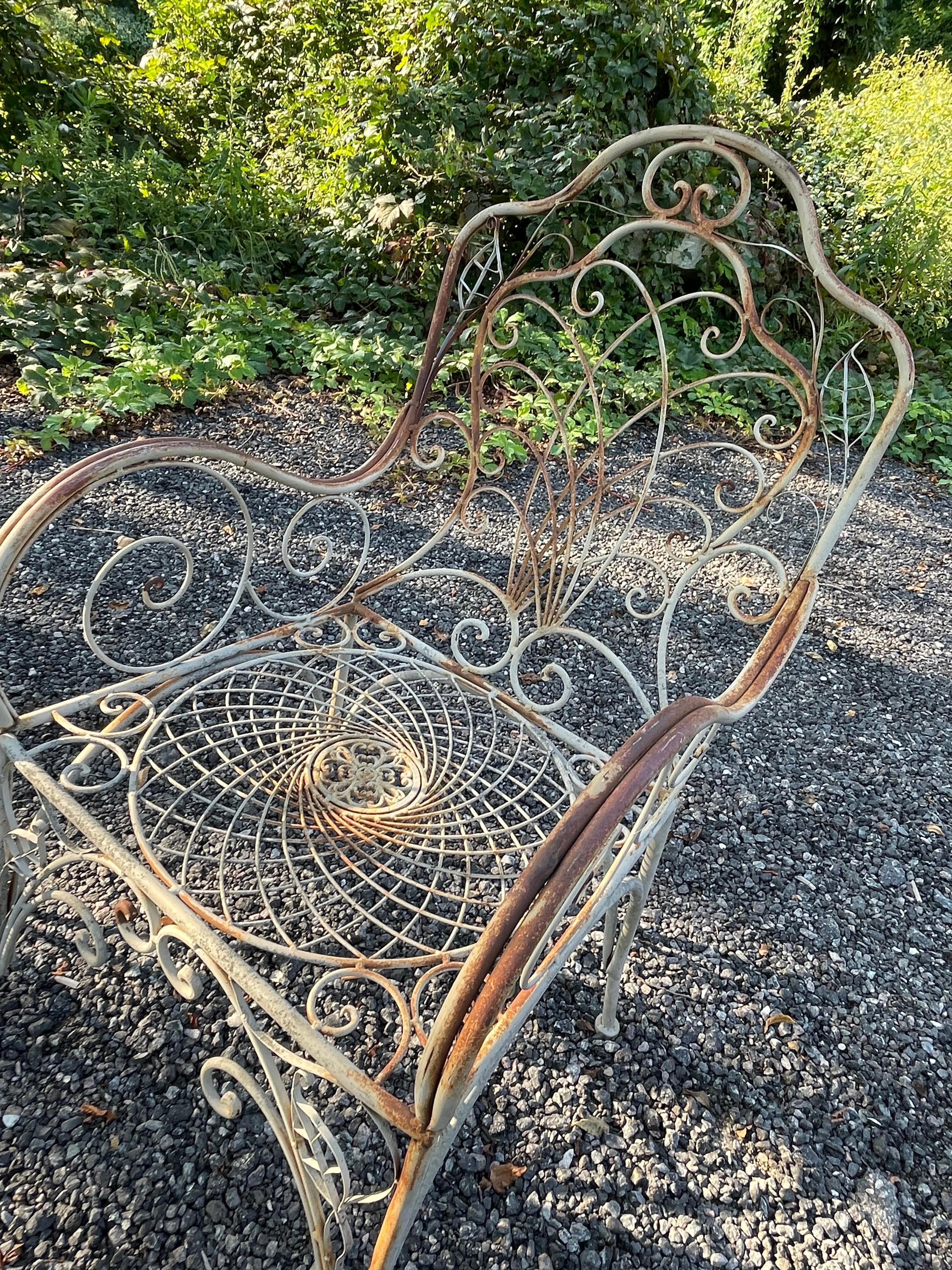 Available now for your enjoyment and ready to ship is a Vintage Wrought Iron Patio Set including a 4 Chairs and 36” Outdoor Patio Table.

This lovely Wrought Iron French Bistro Set is the perfect addition to any garden, terrace, or veranda. Enjoy a