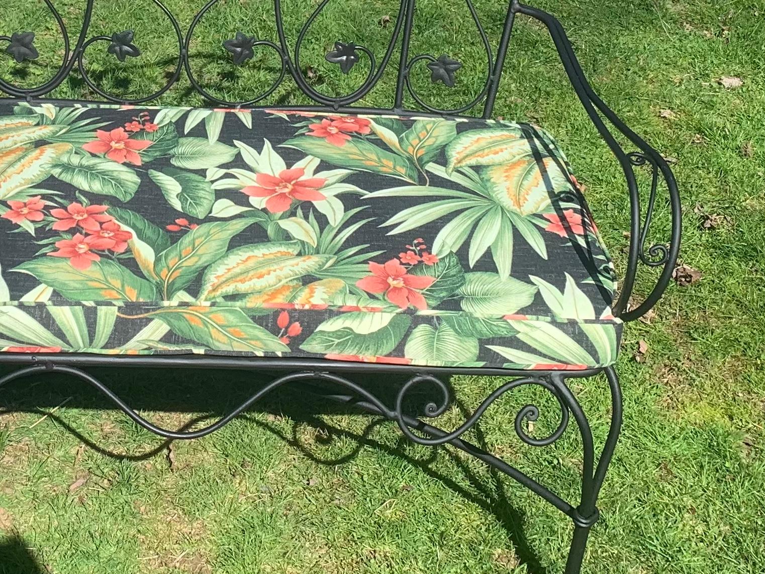 Salterini Style Garden Bench with Custom Cushion.

Intricate Ivy Leaf Detail on Back Rest of Garden Settee/Bench. Generously sized seating for 2. Lattice bottom. Custom cushion made with DryFast Marine Foam is a solarium print. Perfect addition to