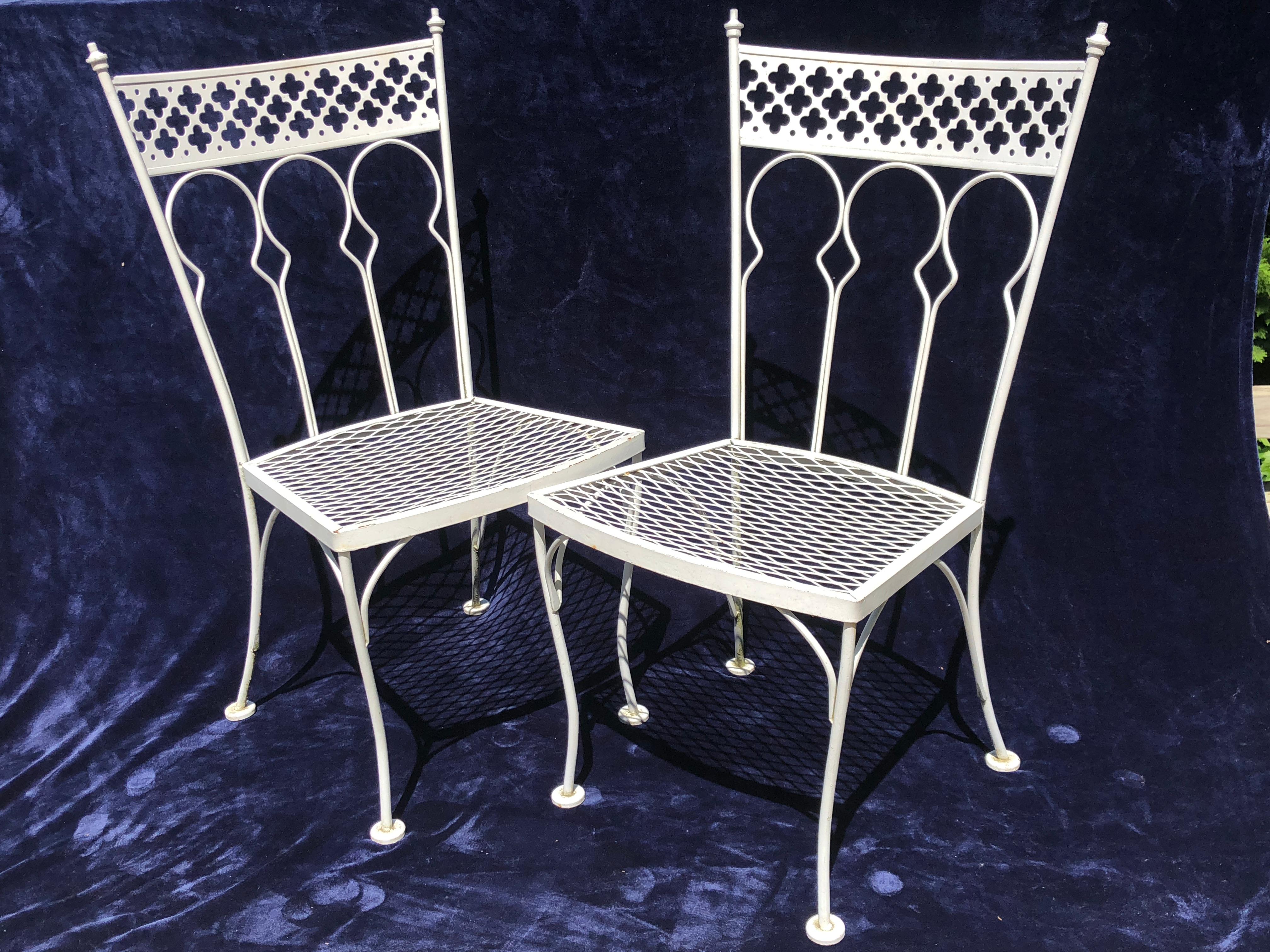 Exquisite pair of Taj Mahal design midcentury rare patio dining chairs.