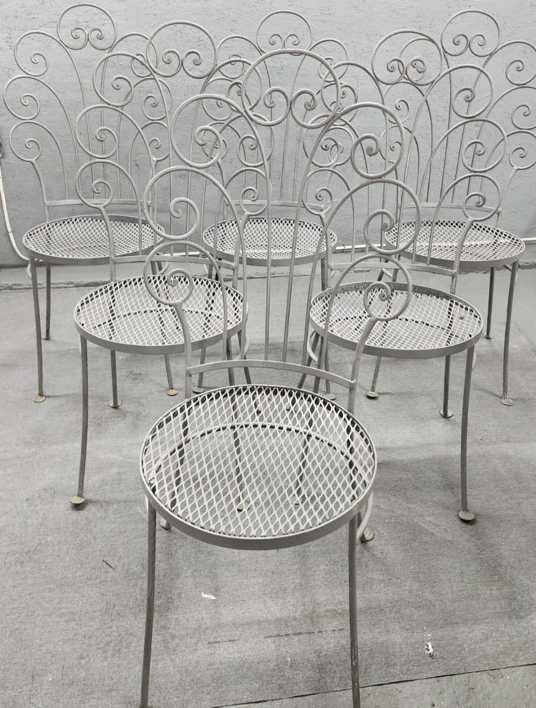 A fantastic set of 6 Salterini Chairs is up for your consideration. Available now and ready to ship. Perfect for any deck garden or patio. Pair the set of 6 wrought iron chairs with 2 matching tables that give you a generous amount of dining space,