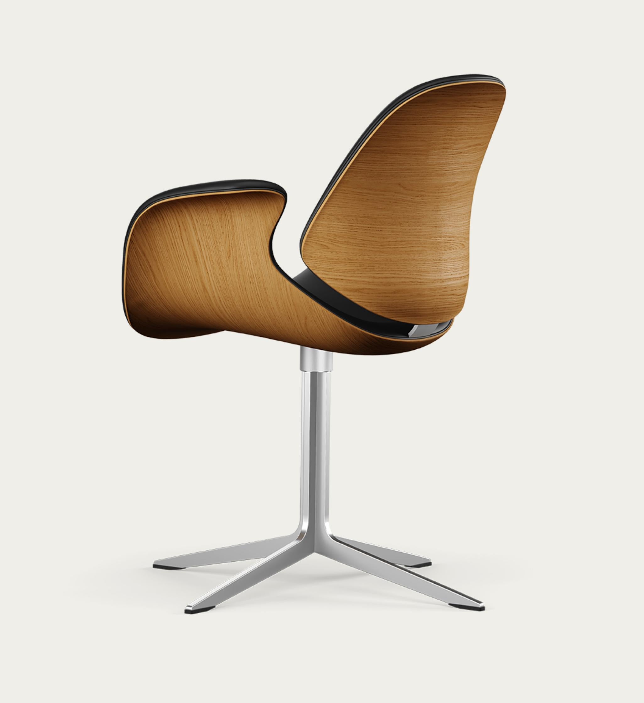 Salto and Sigsgaard Council Chair Wood Types: Oak,  Upholstery: Nevada Leather Black For One Collection.

The Council Chair, designed in 2011 by Kasper Salto & Thomas Sigsgaard, was specifically designed for the Trusteeship Council Chamber at the