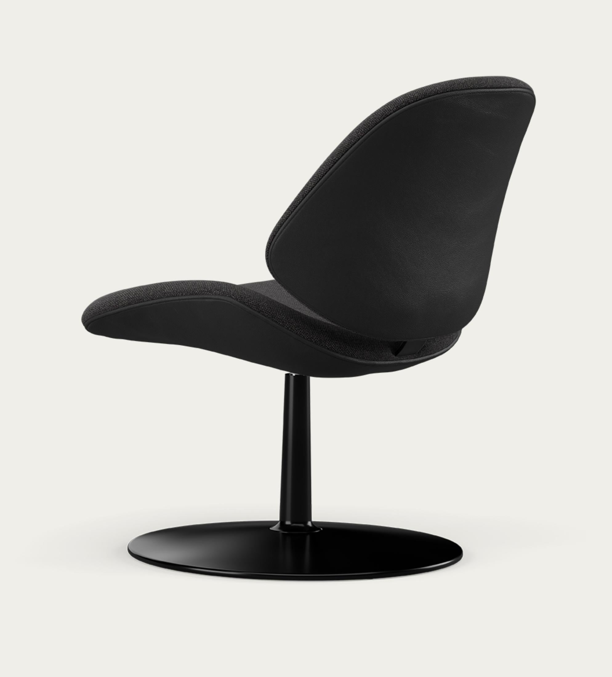 Salto and Sigsgaard Council Family Lounge Chair Legs: Black, Duo Upholstery: Front: Re-wool 198 + Back: Prestige Black
 For One Collection 

Like the other chairs in the Council Family Series, the lounge version is designed with a consideration for